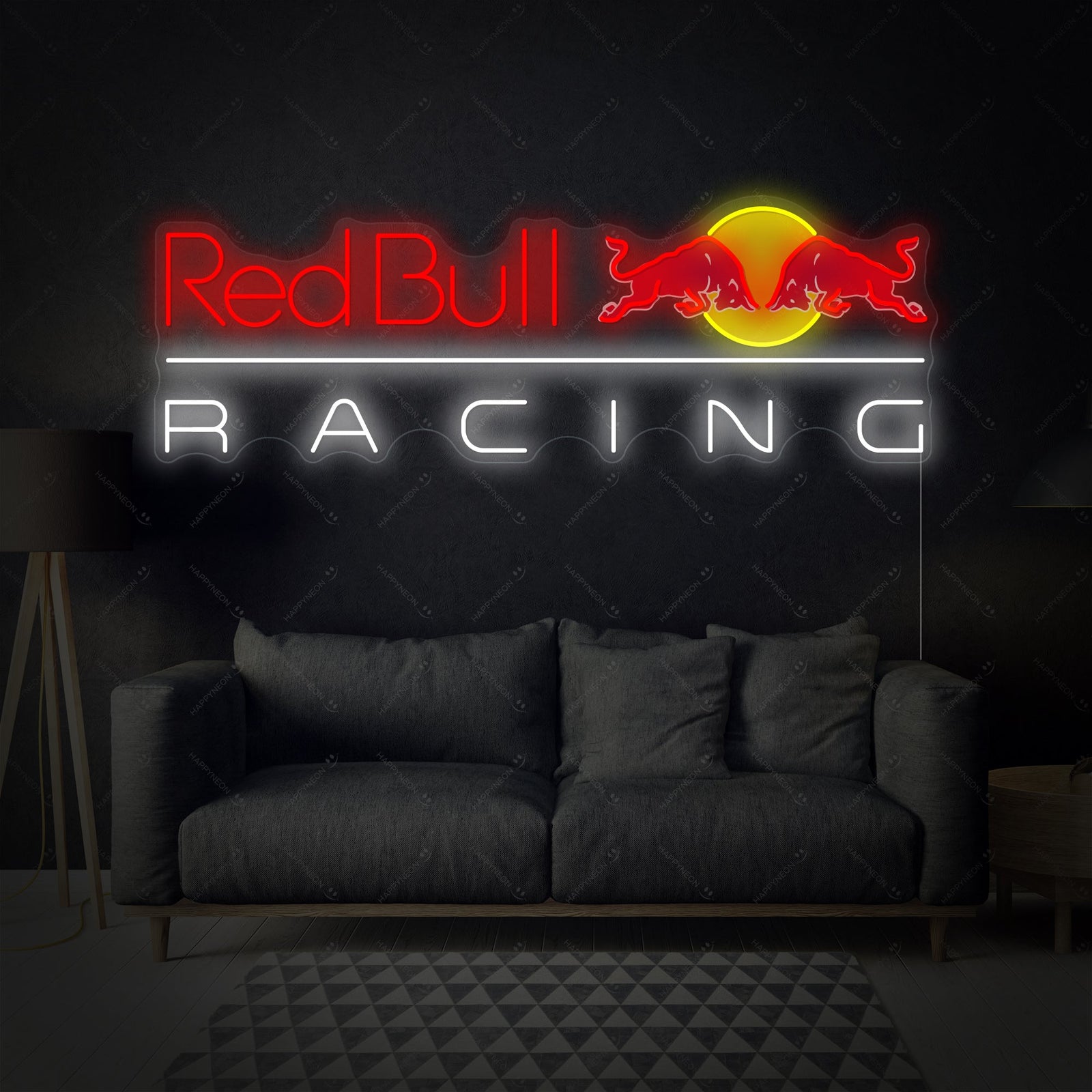A clean, stylized photograph of an lit Racing neon wall light in red, glowing brightly over a modern desk setup and grey wall in a sophisticated home office or game room.
