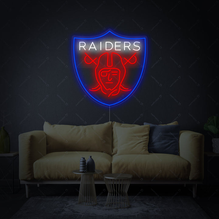 Detailed graphic representation of the Raiders shield neon sign design with glowing elements
