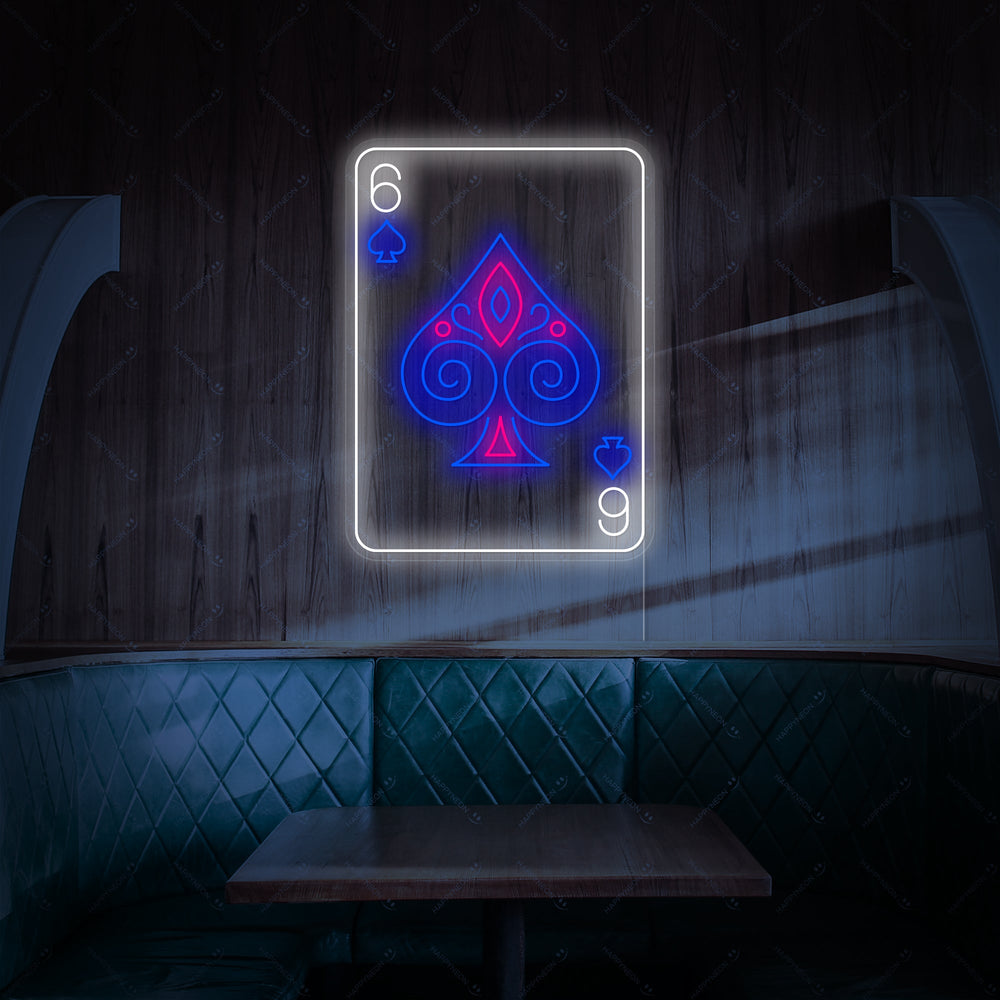 Poker 6 Neon Sign glowing brightly on a textured wall.