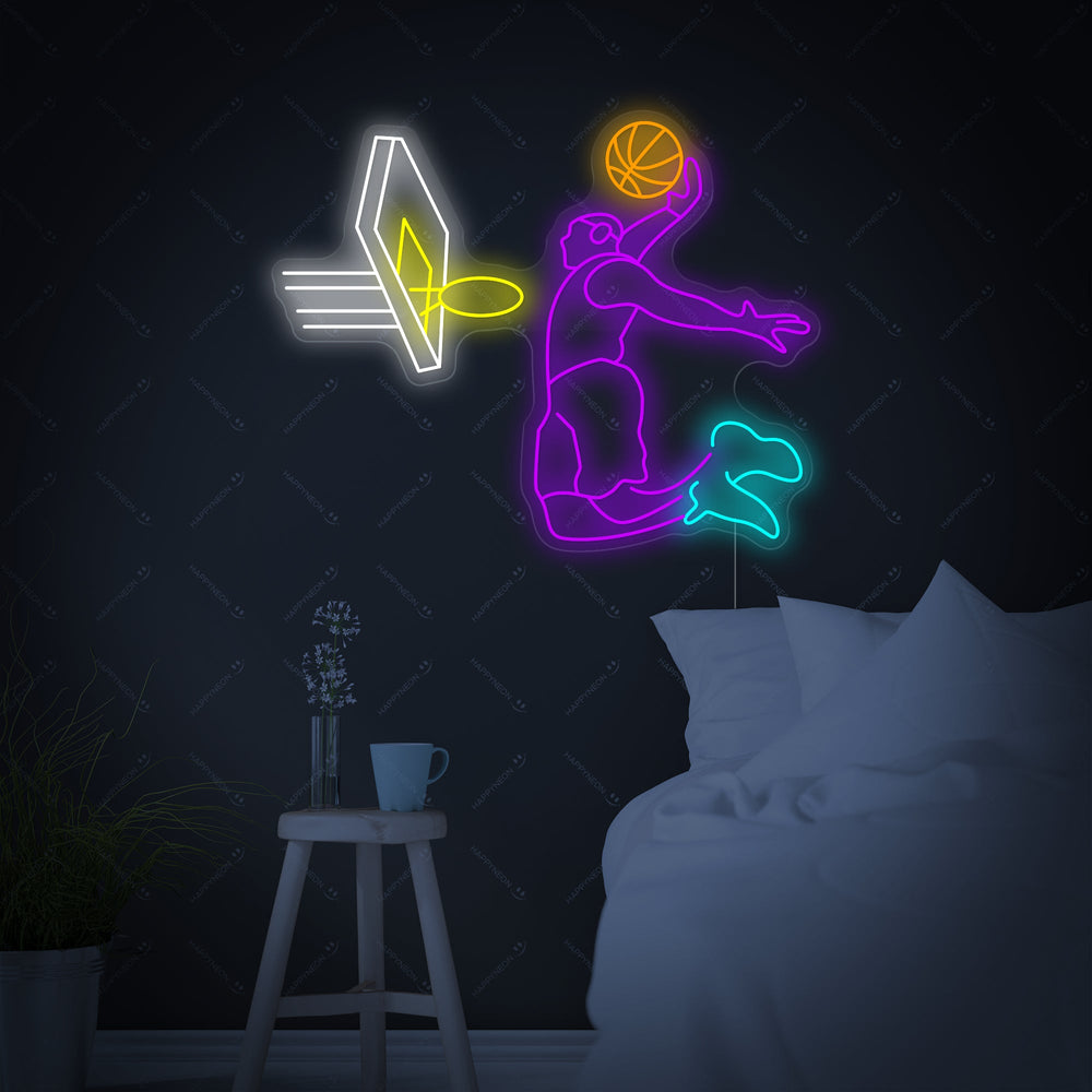 A graphic design image illustrating the glowing silhouette of a basketball player in a dunking pose, rendered as a custom neon sign.
