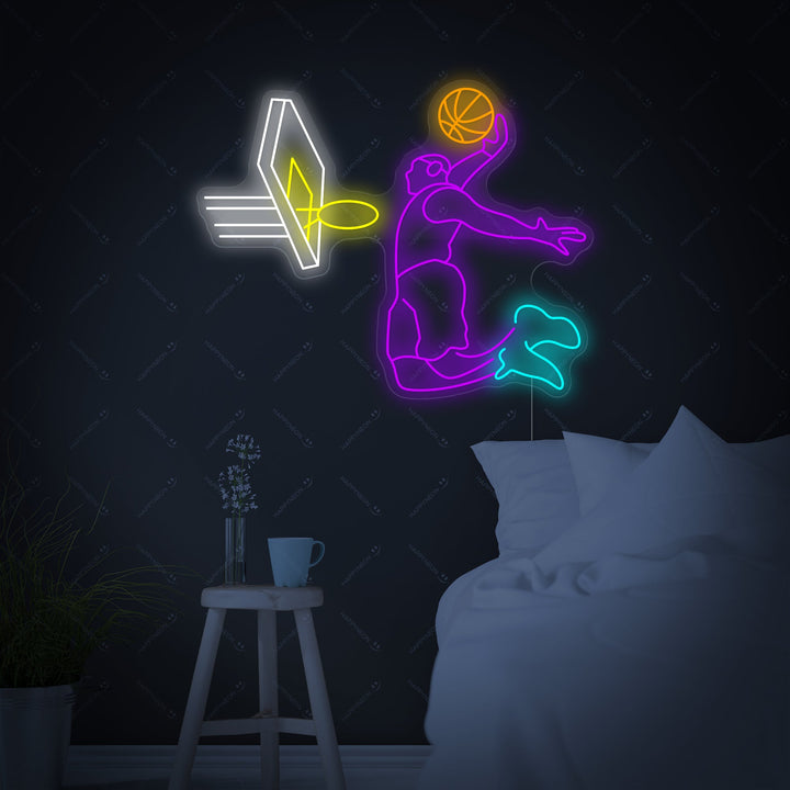 A graphic design image illustrating the glowing silhouette of a basketball player in a dunking pose, rendered as a custom neon sign.