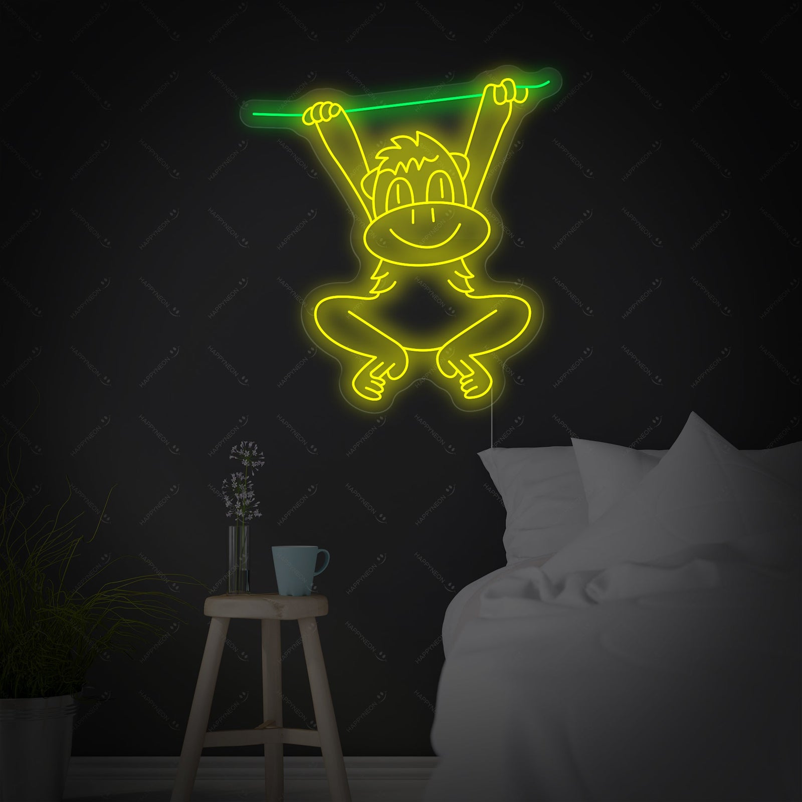 The glowing orange 'Swinging Monkey' neon sign mounted on a clean white wall.