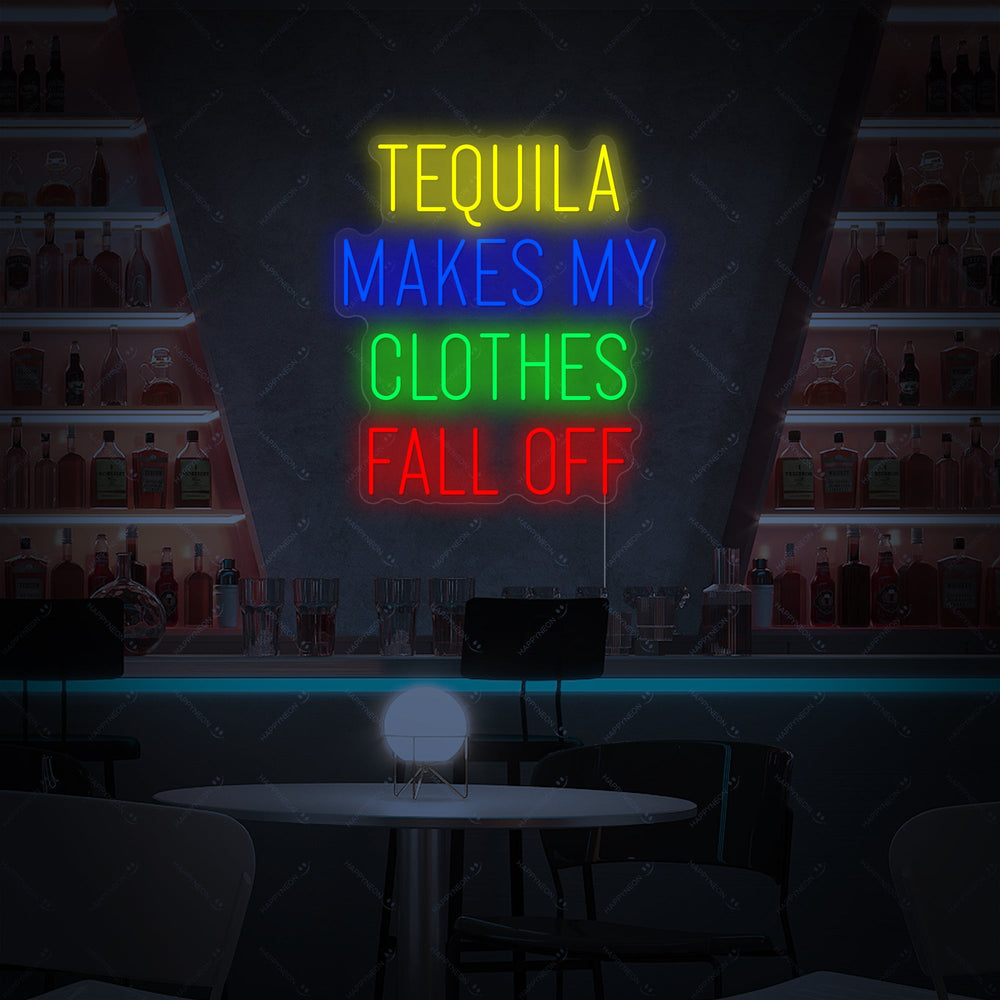 A 'Tequila Makes My Clothes Fall Off' neon sign displayed against a brick wall.