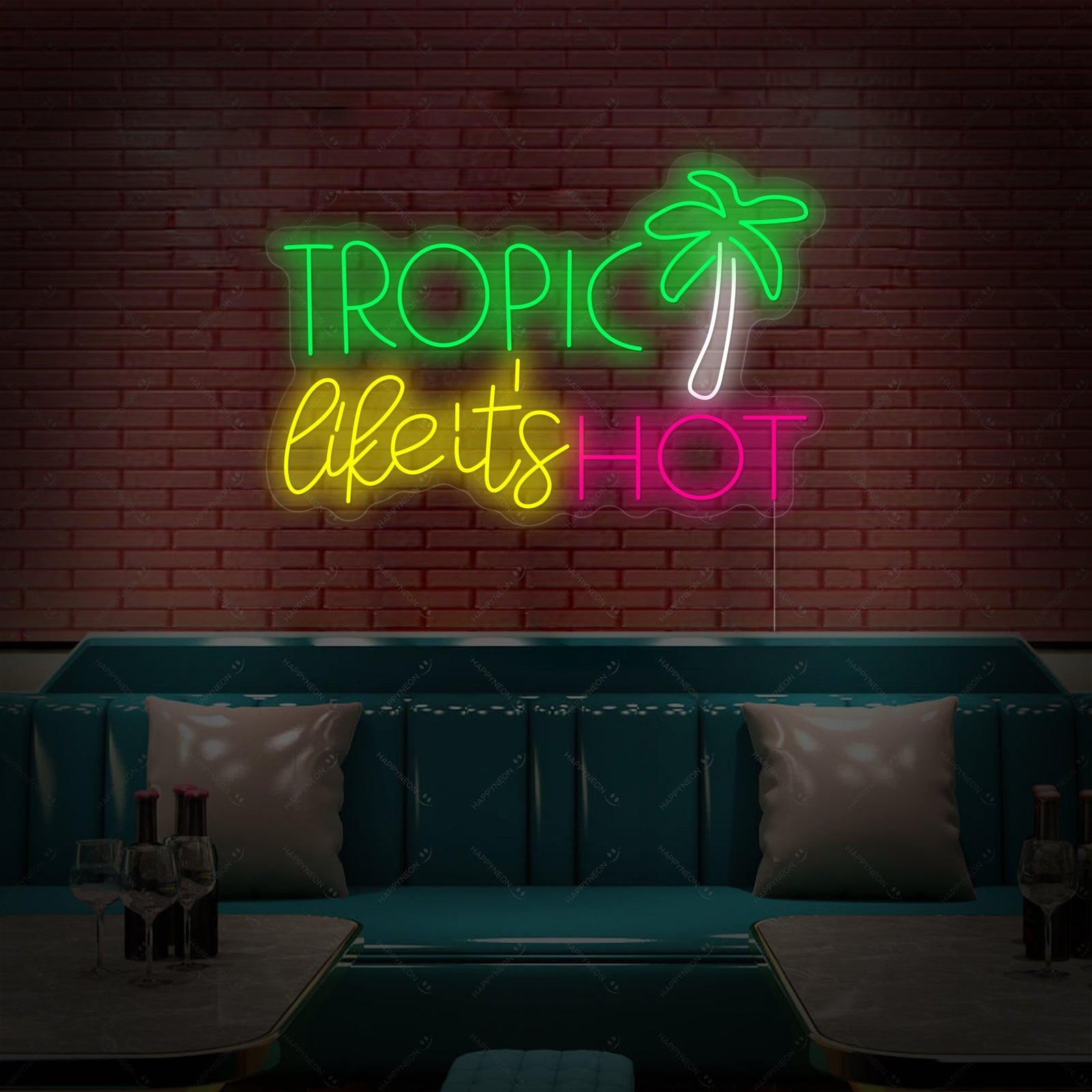A detailed view of the handmade 'Tropic like Its Hot' neon sign featuring bright lettering on a durable acrylic backing.