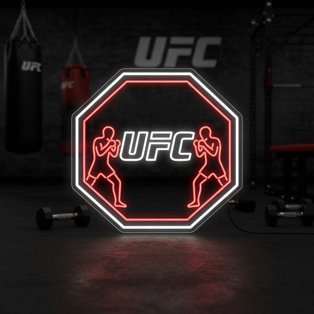 A lifestyle mockup of the UFC Octagon Fighters neon sign lighting up a dark, moody gym wall above training equipment.
