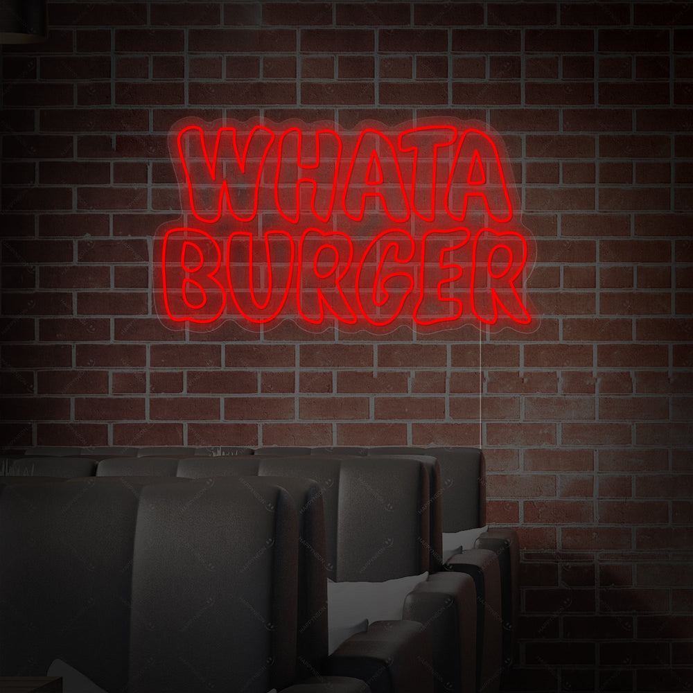 A direct frontal photograph of the Whataburger neon sign, clearly showing its design, neon tubing structure, and simple mounting hardware.