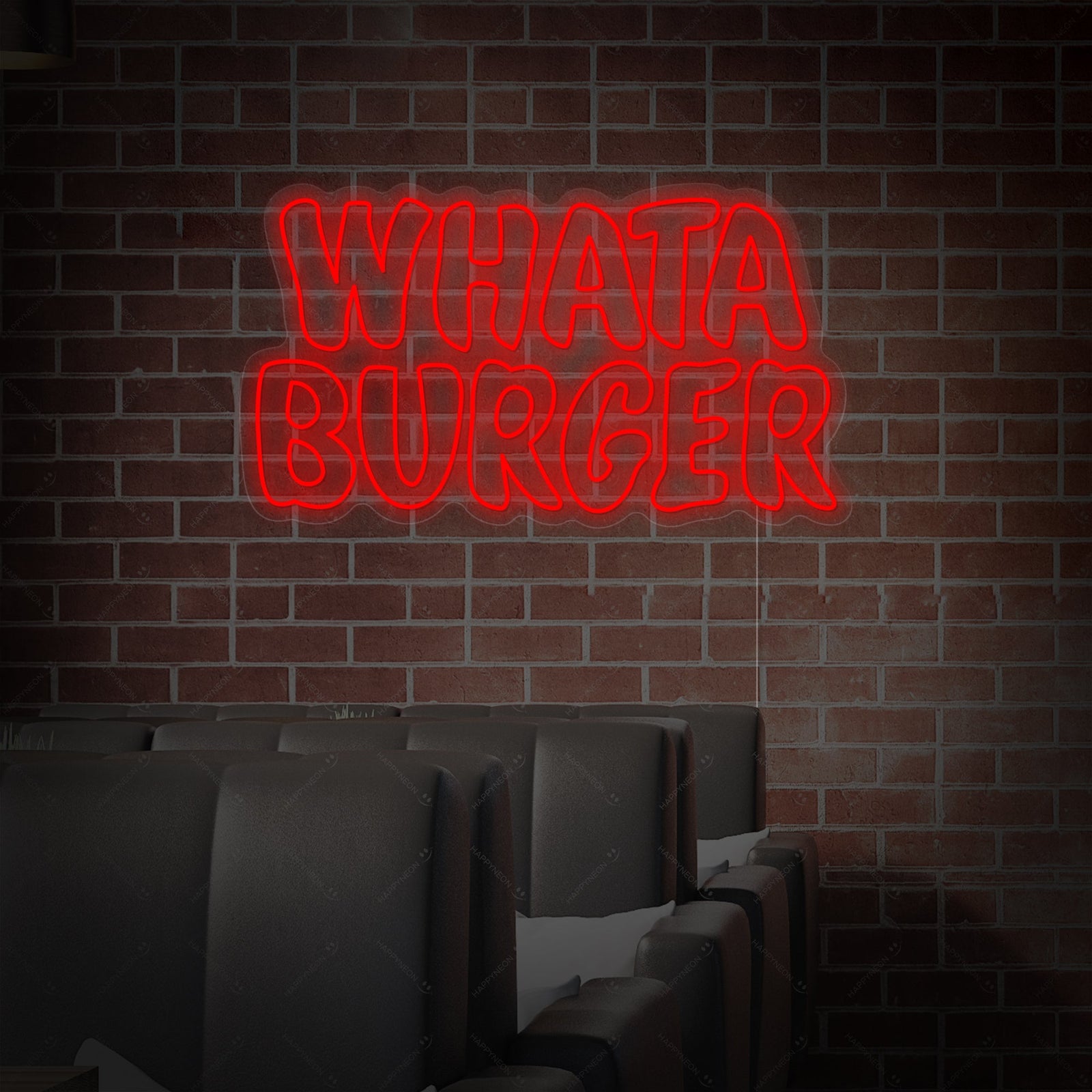 A direct frontal photograph of the Whataburger neon sign, clearly showing its design, neon tubing structure, and simple mounting hardware.