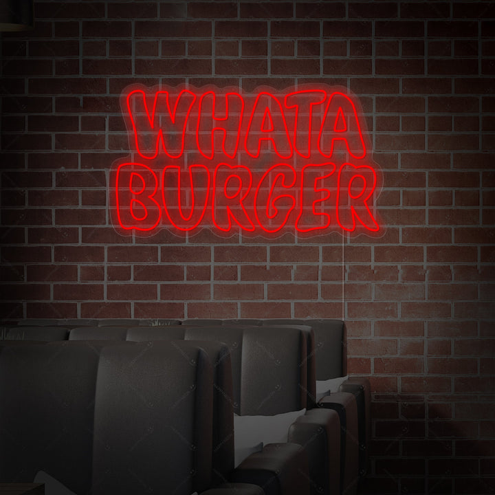 A direct frontal photograph of the Whataburger neon sign, clearly showing its design, neon tubing structure, and simple mounting hardware.