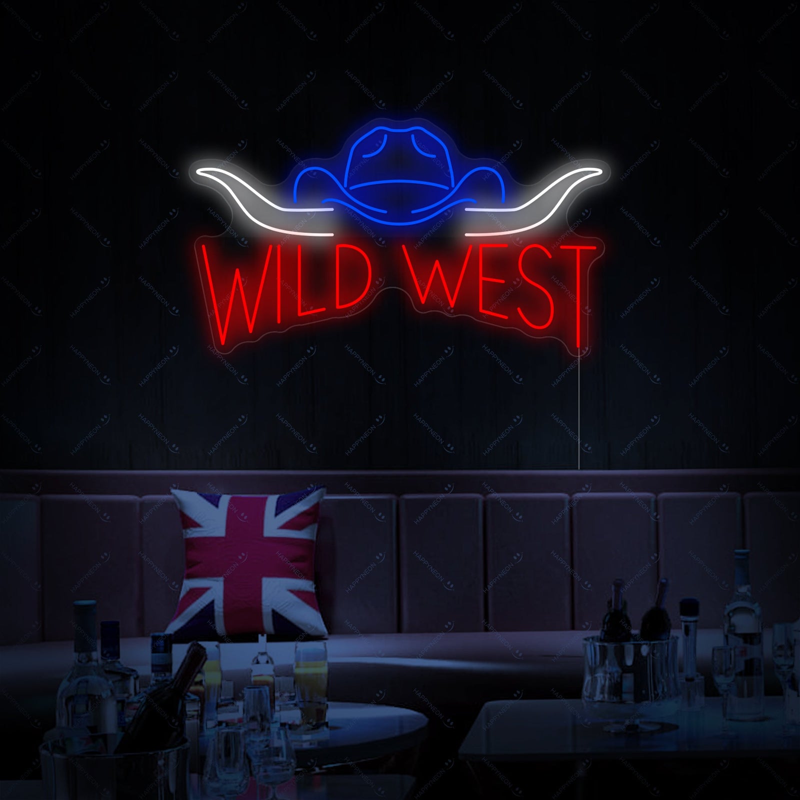 A 'Wild West' neon sign in glowing script serves as the focal point above a rustic fireplace. The surrounding living area features Western decor, including comfortable seating, antlers, and rich wood tones.