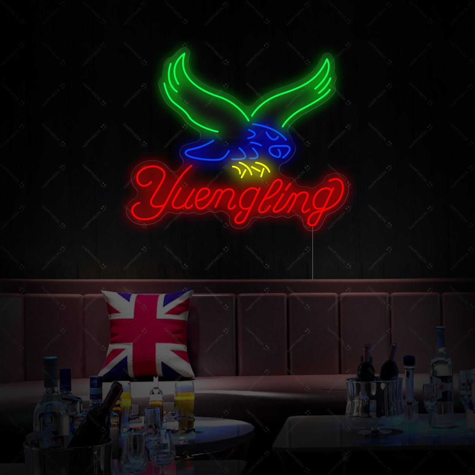 A Yuengling neon sign, featuring the classic script logo and eagle graphic in red and white.