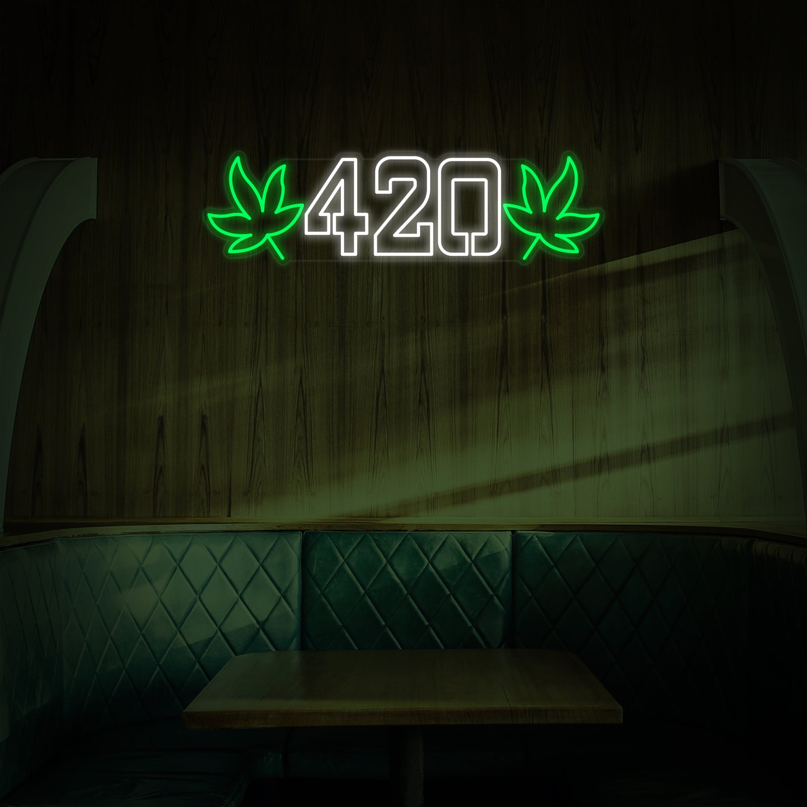 Vibrant green glowing LED neon sign of a stylized cannabis leaf and the word "420" lit up on a brick wall background, creating an aesthetic atmosphere.