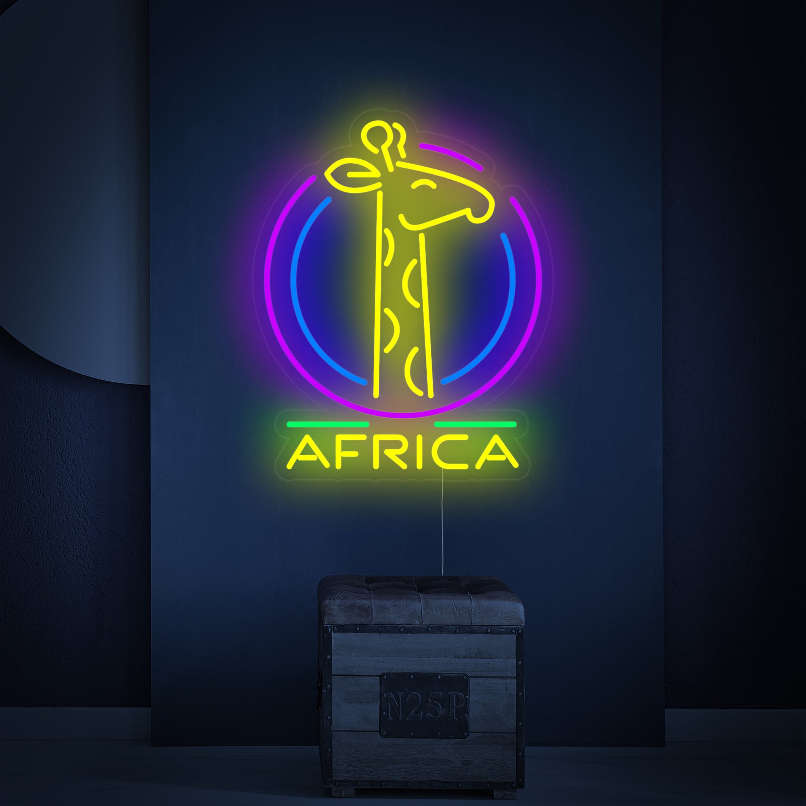 The Africa Giraffe neon sign glowing brightly, showing the detailed shape of the giraffe and trees against a neutral background.