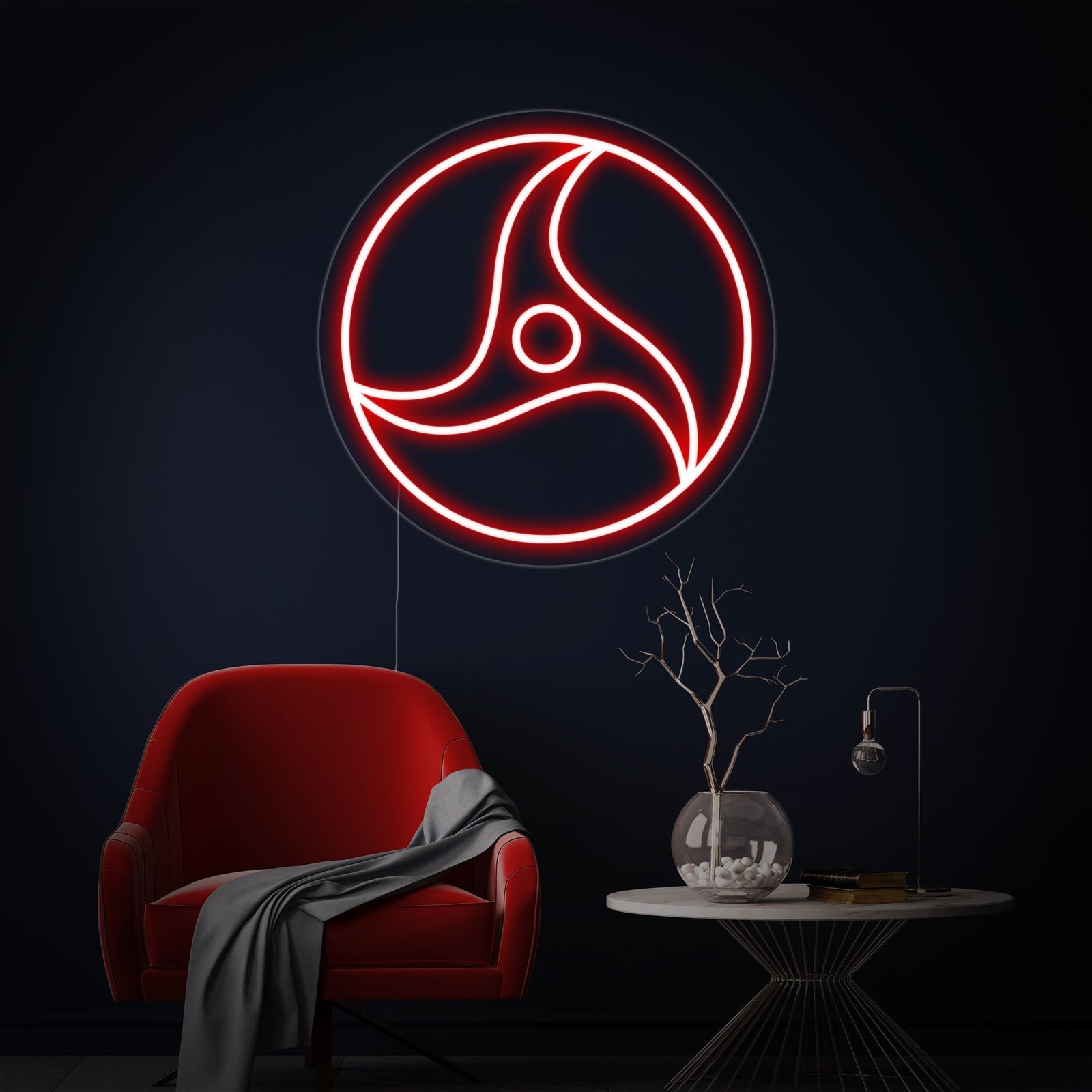 Close-up of the red Akatsuki cloud neon sign glowing brightly in a dark room.