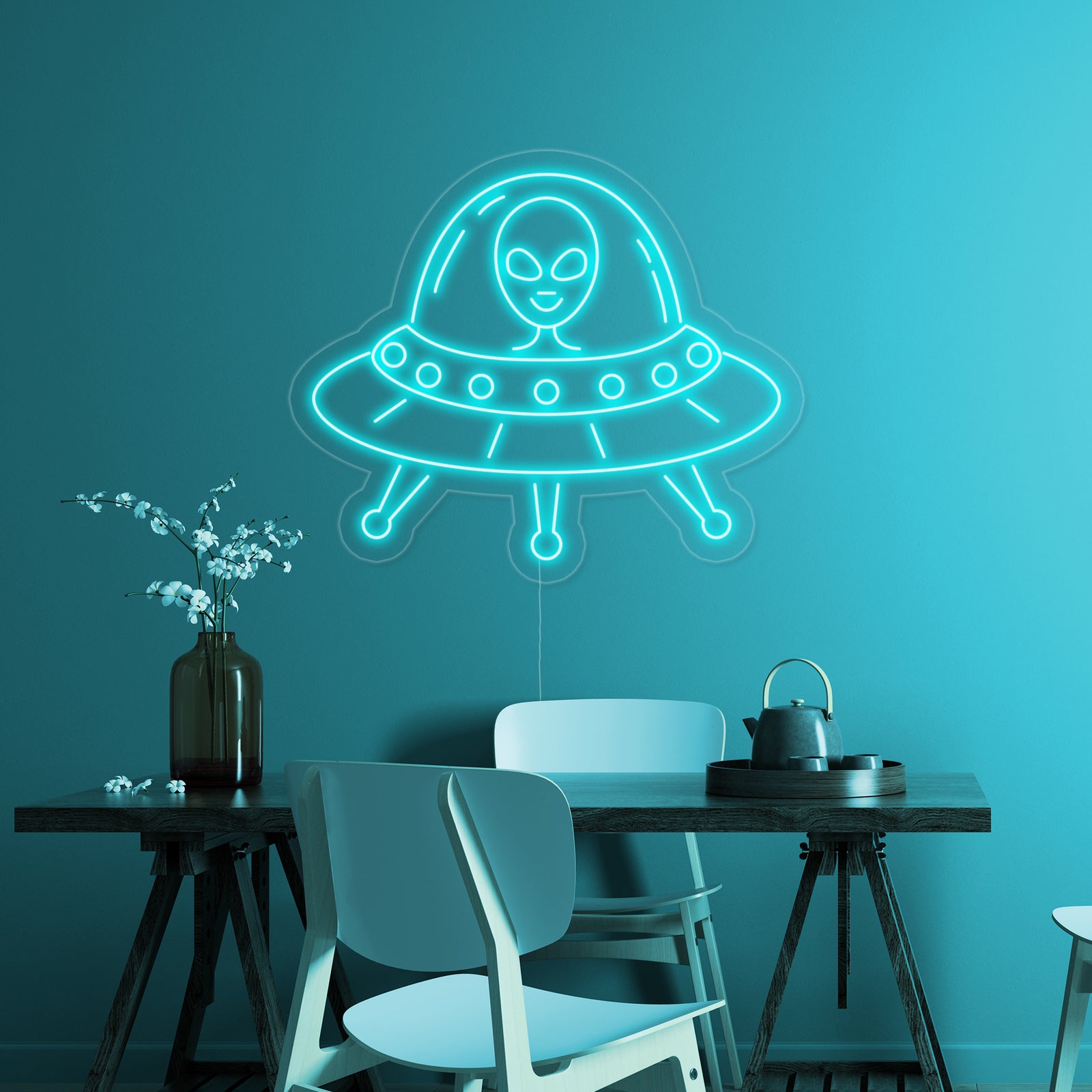 A close-up view of the 'Alien UFO' neon sign design featuring clear physical tubing mounted on an acrylic backer.