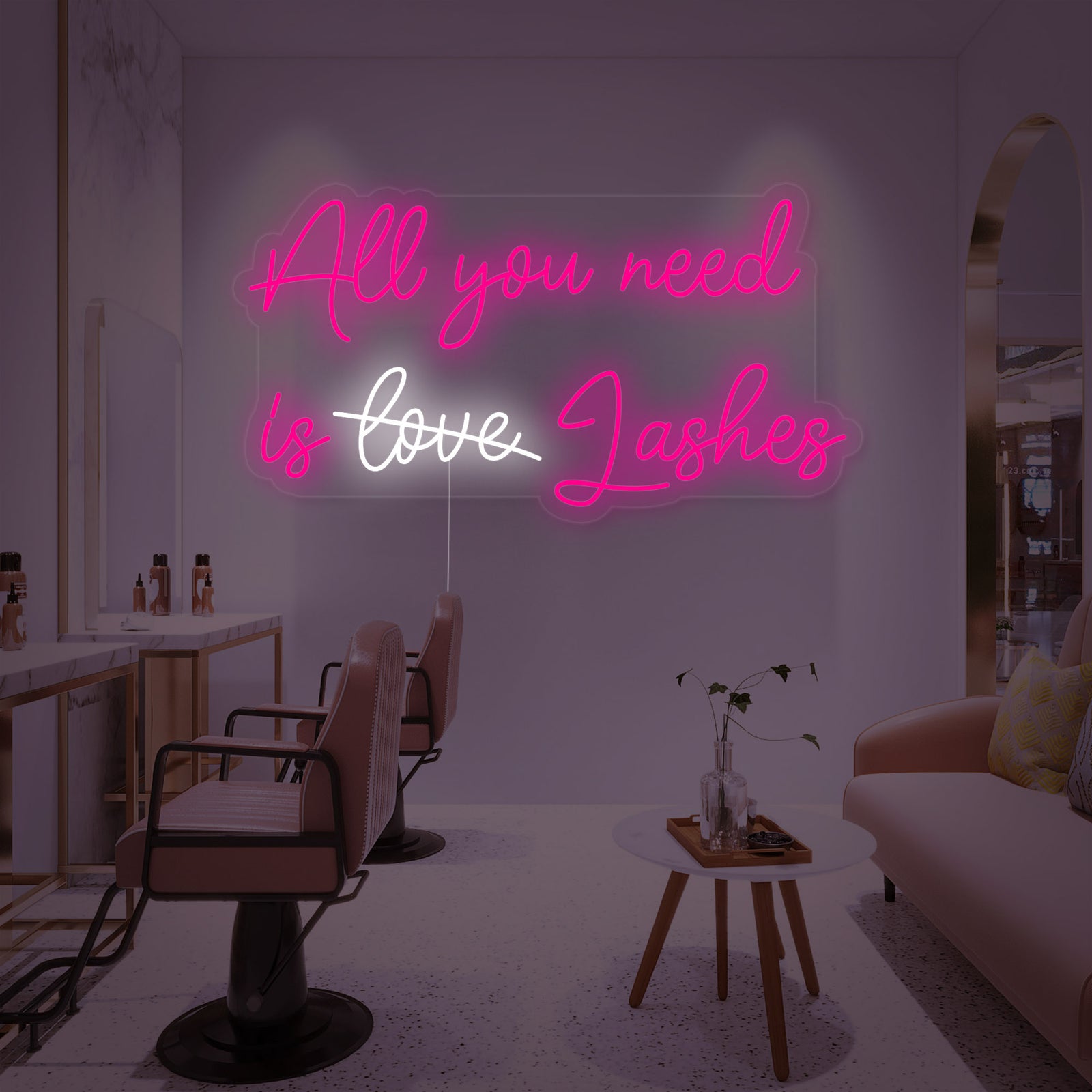 Detailed product shot of the "All You Need Is Lashes" neon sign glowing against a neutral background.