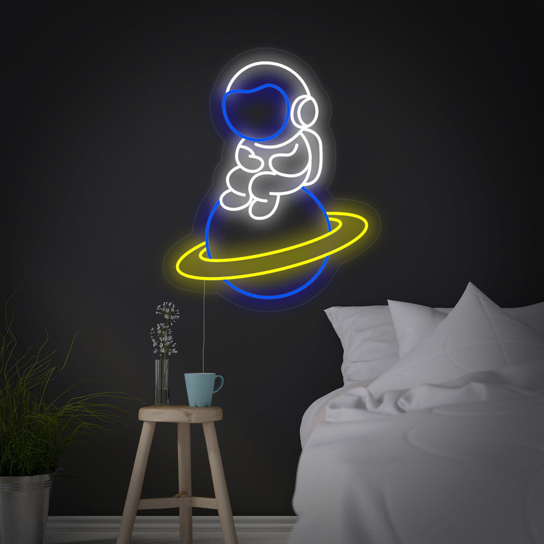 "Astronaut Spaceman Sitting On Planet" Neon Sign