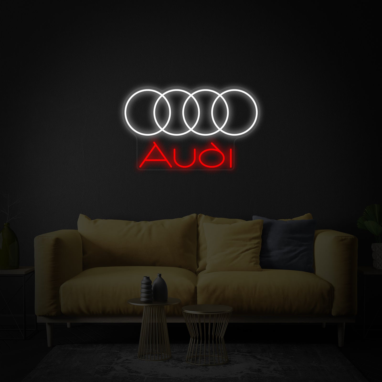 A glowing four circles neon sign displayed on a clean white wall in a modern living room above a couch, creating a stylized atmosphere.