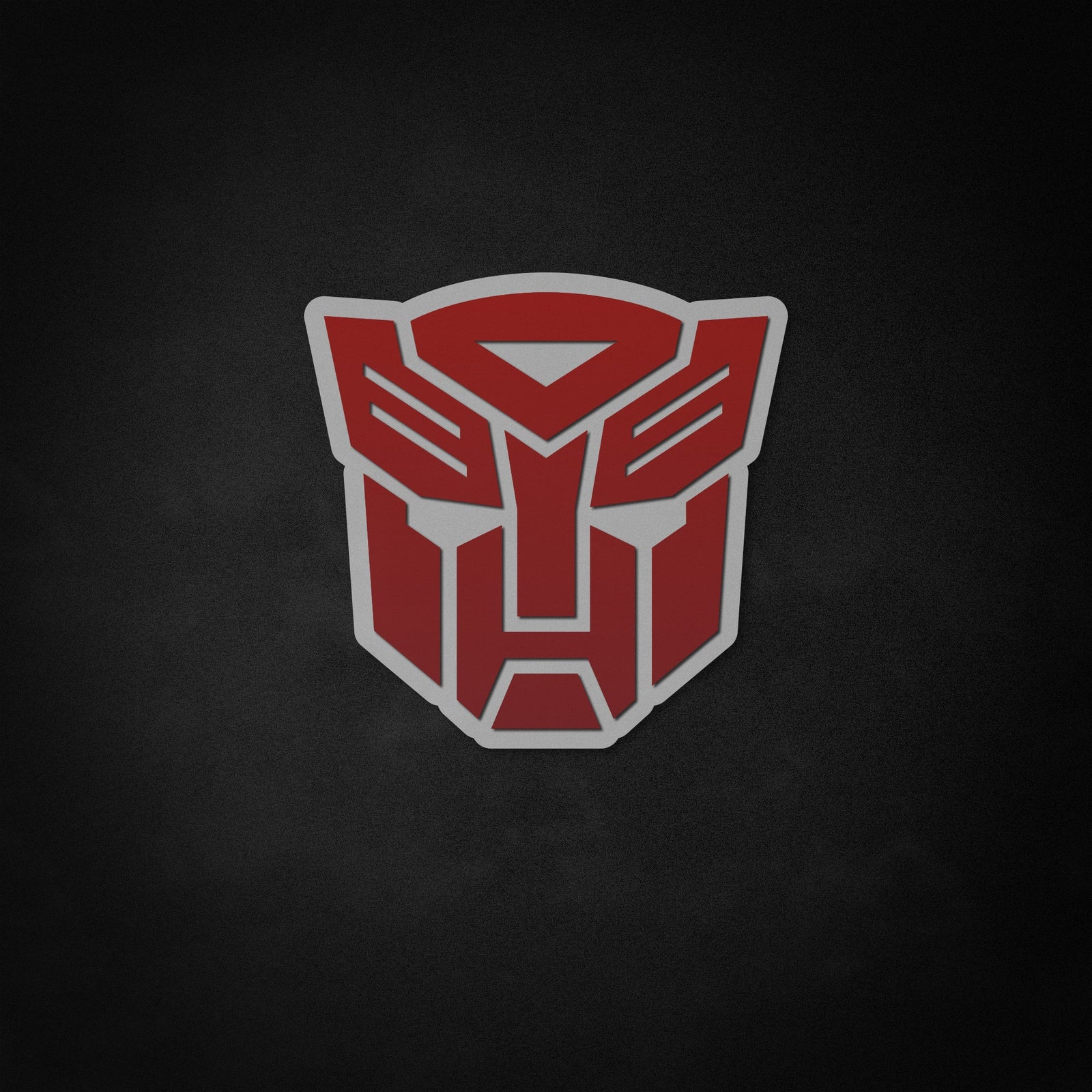 A graphic design image illustrating the illuminated Autobot logo, serving as the concept art for the neon wall sign.