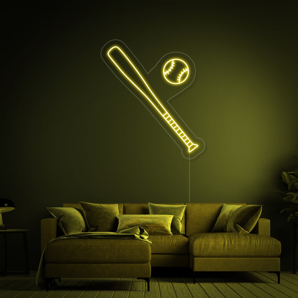 The 'Baseball Bat Ball' neon sign glowing brightly in a dim room with a sleek, minimalist aesthetic.