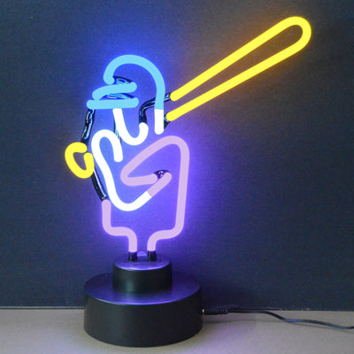 A close-up view of a physical baseball table neon sign glowing on a desk, with detailed glass tubes, wiring, electrodes, and a power jack visible.