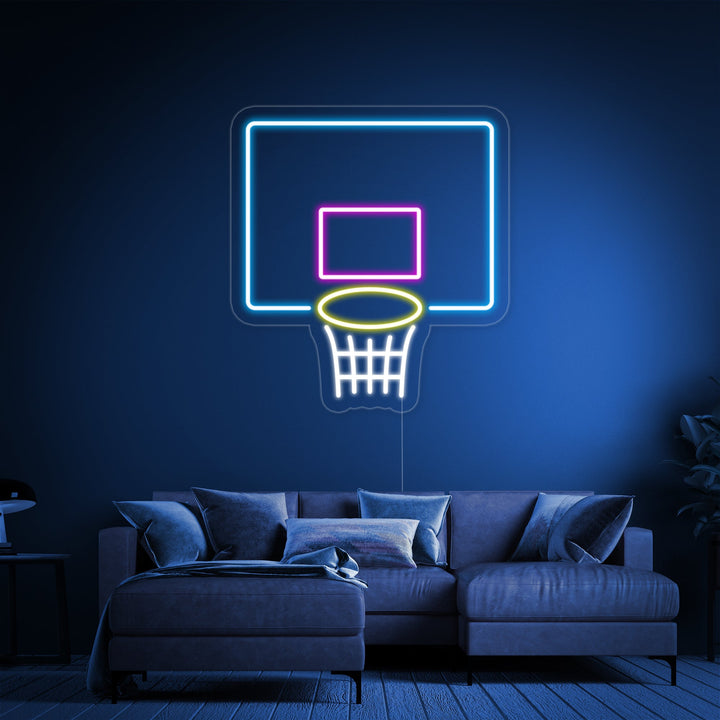 A basketball board and net neon sign provides a bright, atmospheric glow in a modern living room setting.