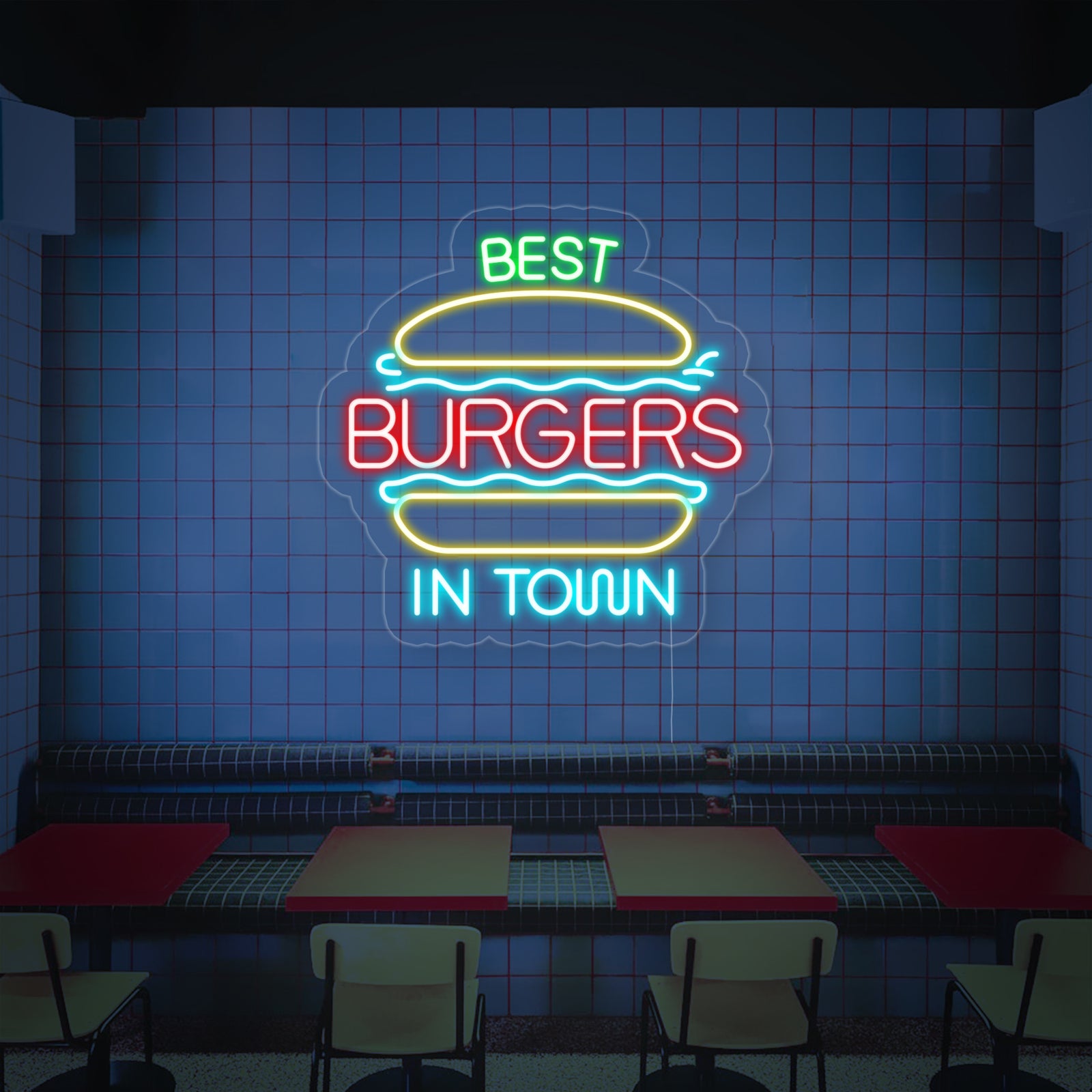 The 'Best Burgers in Town' neon sign with hamburger graphic, glowing prominently on an industrial-style wall inside a modern burger joint, featuring contemporary seating and warm lighting in the background.
