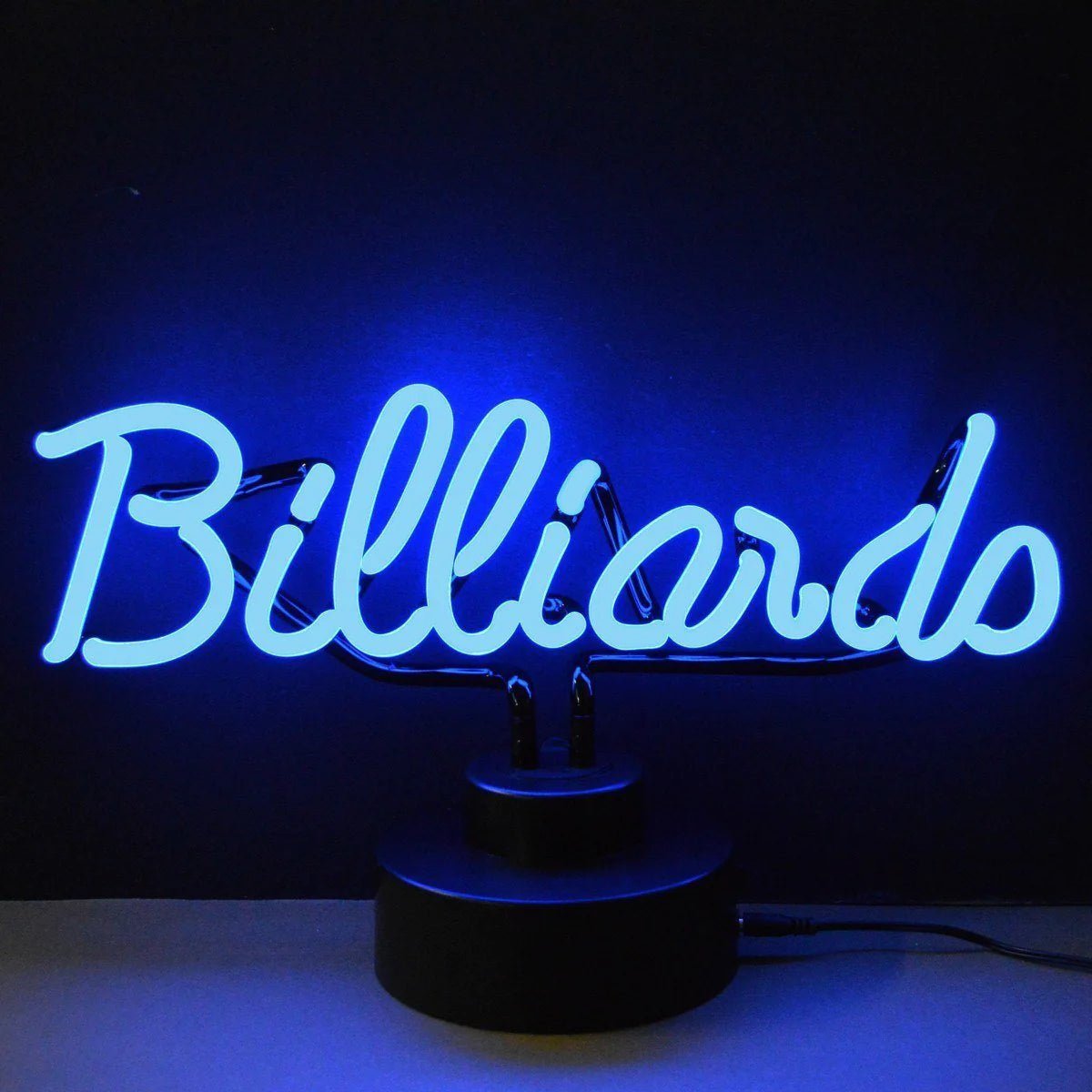 A handcrafted blue and white 'Billiards' neon sign sitting on a dark wooden base against a blurred grey background.