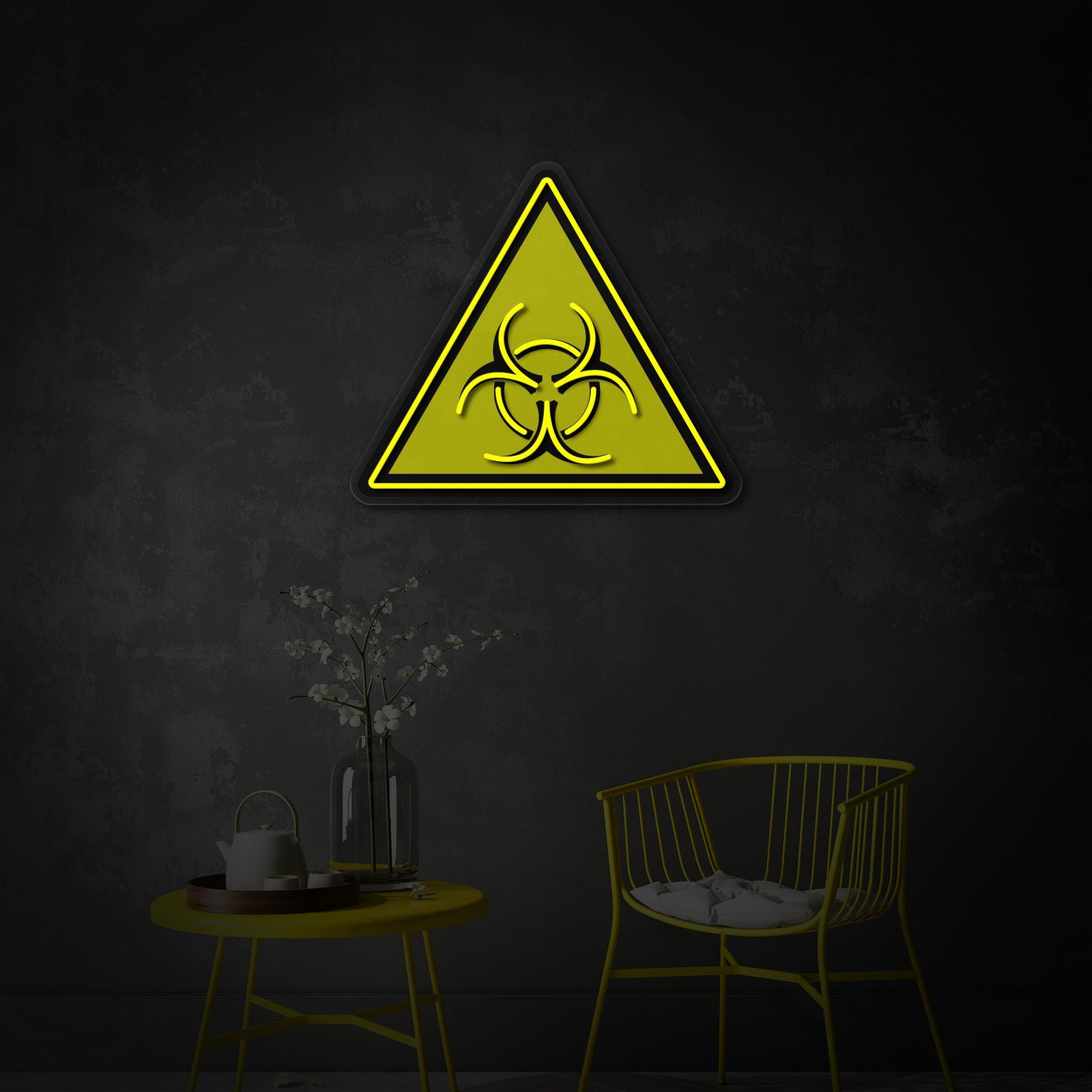 A side view detail of the Biohazard Warning UV print neon sign, showing the clear acrylic backing and glowing edges as it is styled on a shelf above a modern chair.