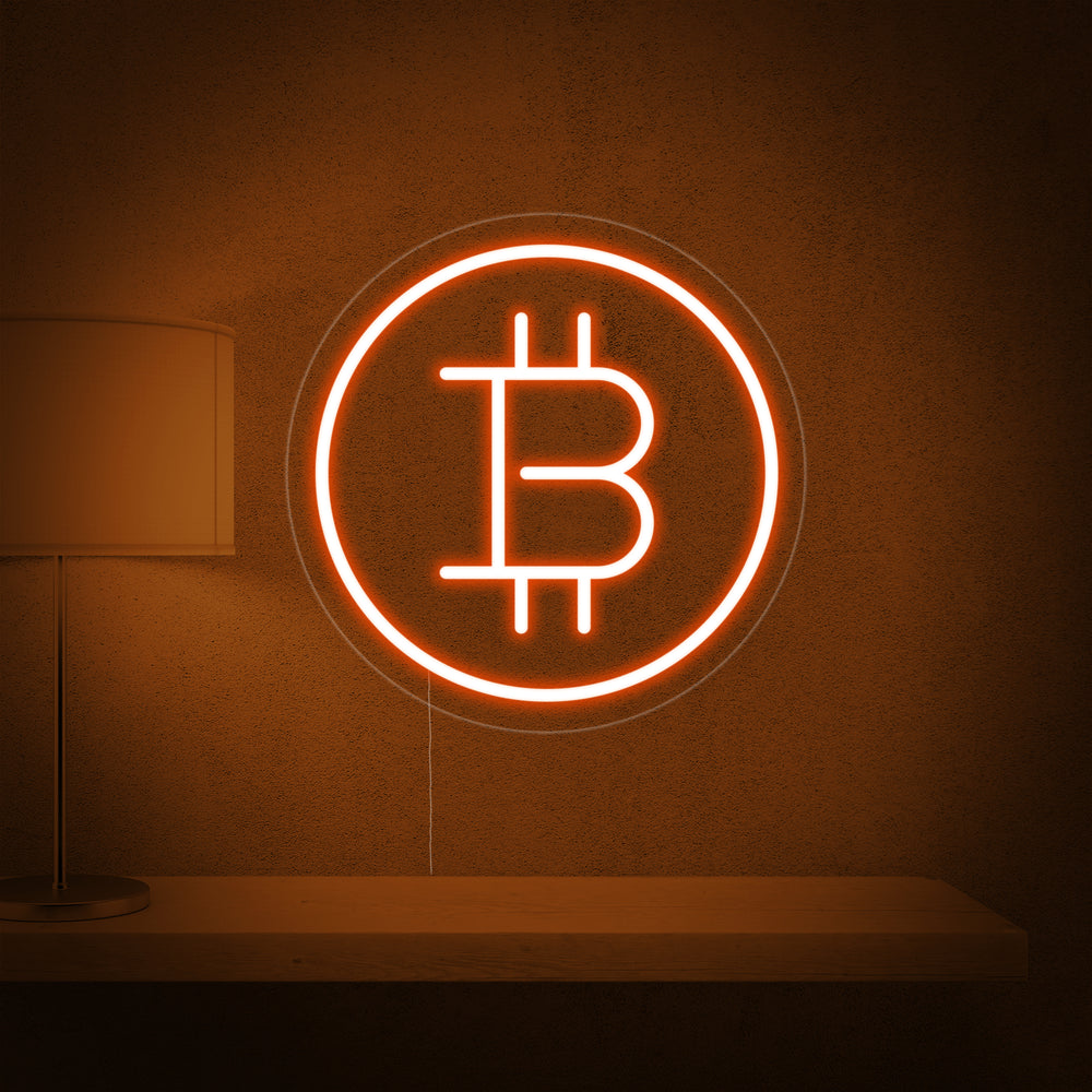 Close-up detail of the 'Bitcoin' symbol neon tubing on a wall.