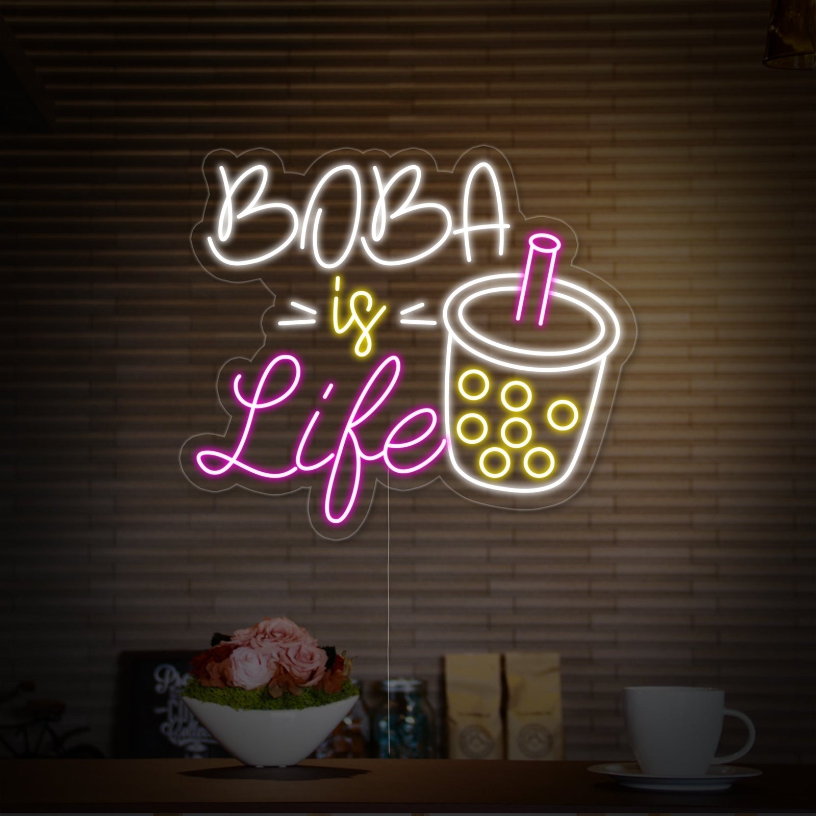 Close-up of the 'Boba is Life' neon sign design against a light background, highlighting its clear acrylic backing and intricate tube details.