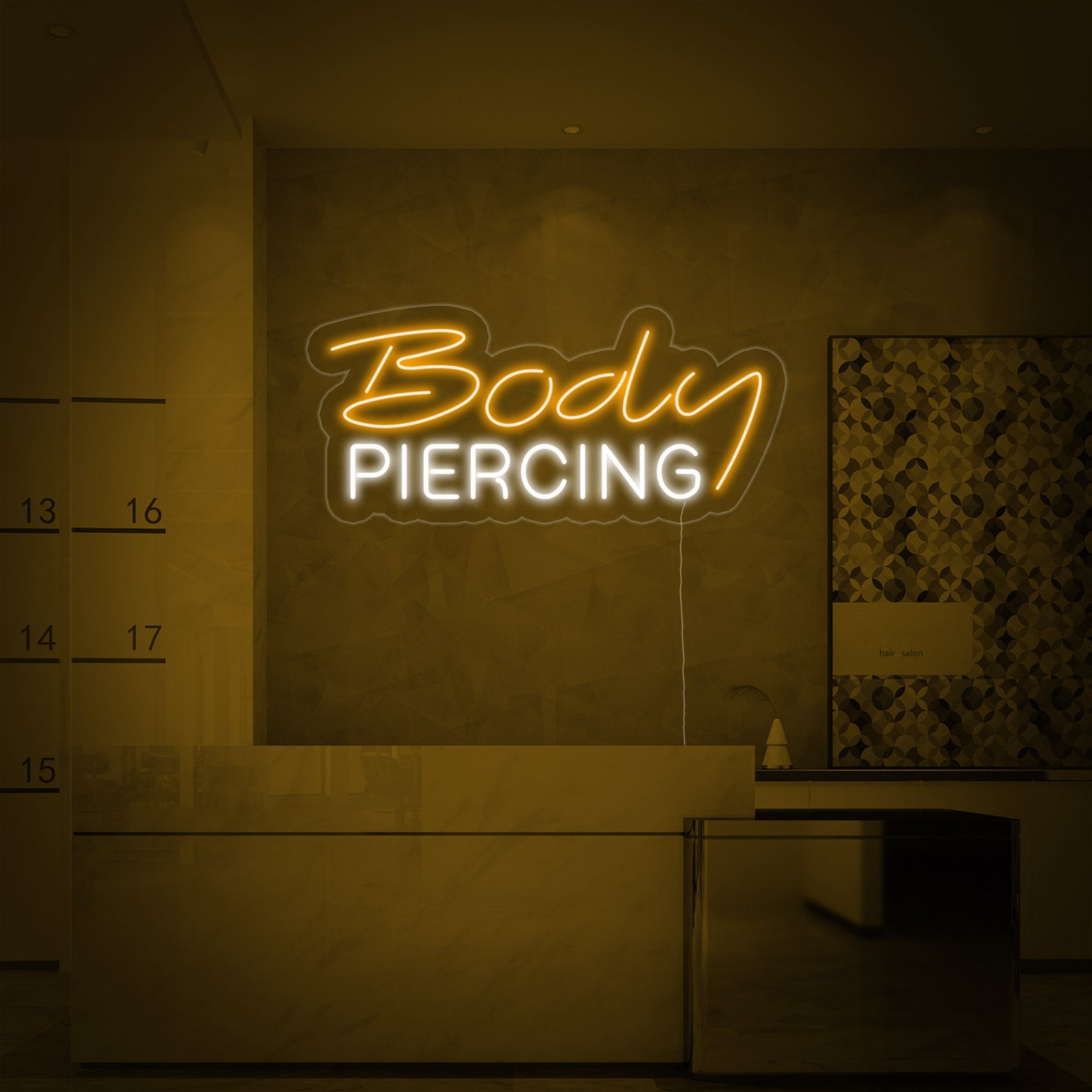 A close-up photograph of the 'Body Piercing' neon sign displaying its crisp neon tubing design.