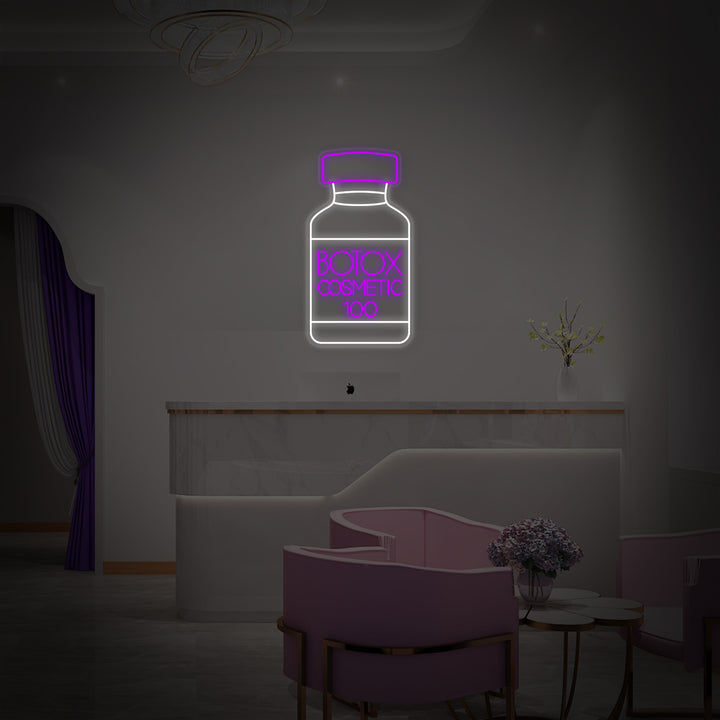 High-quality photograph of a modern reception area featuring the 'Botox Cosmetic Shop Skin Care Center' neon sign mounted prominently on the wall.