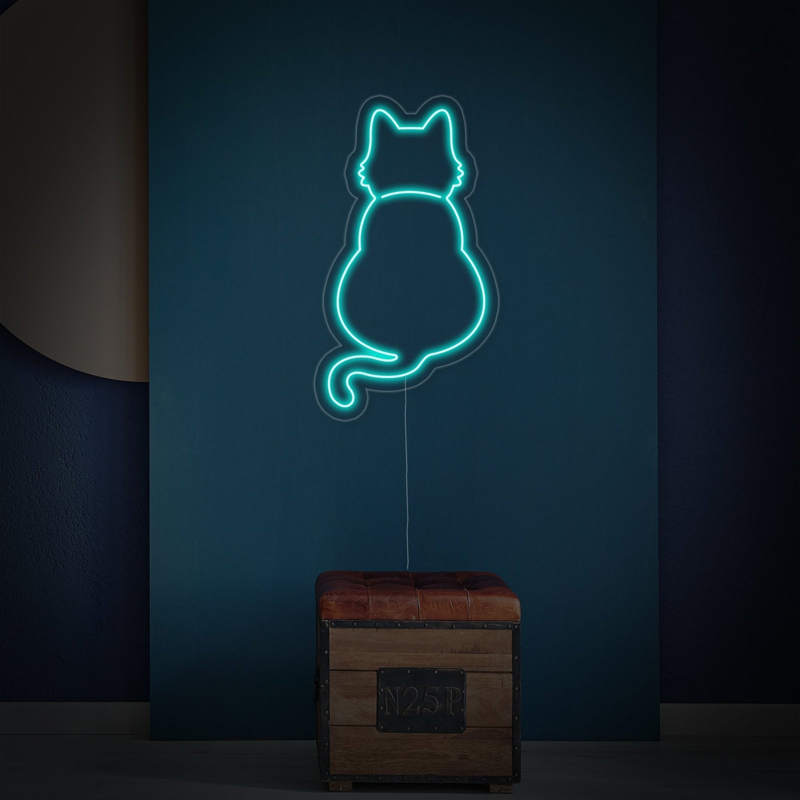 A glowing LED neon wall light shaped like a friendly cat, showing detailed craftsmanship including the subtle depth of the tubing.