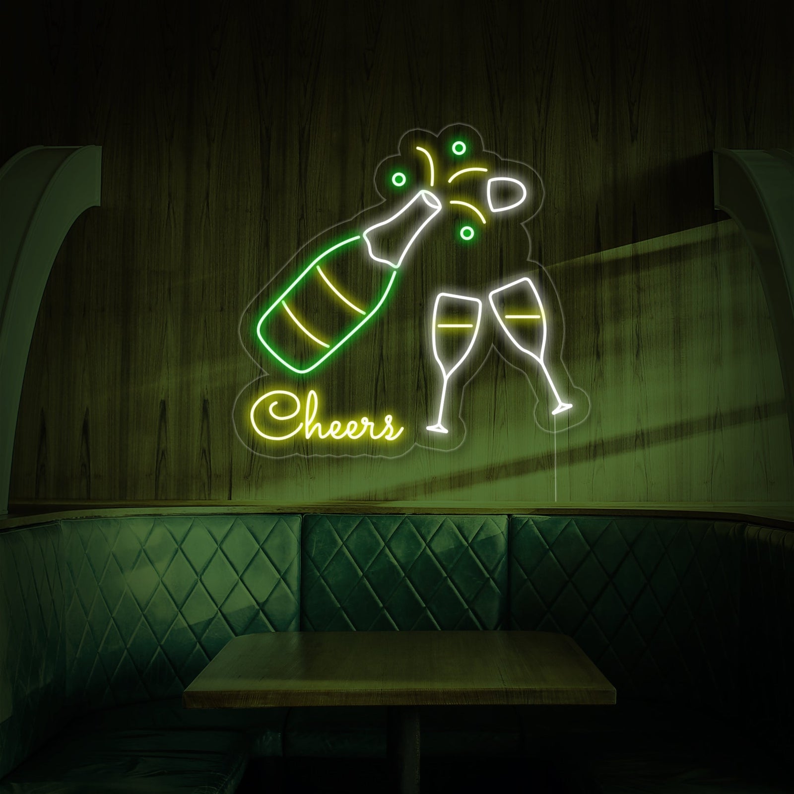 Studio product shot of the 'Champagne Bottle Glasses Cheers' neon sign displaying the details of the neon tubes and clear acrylic backing, set against a blurred background.