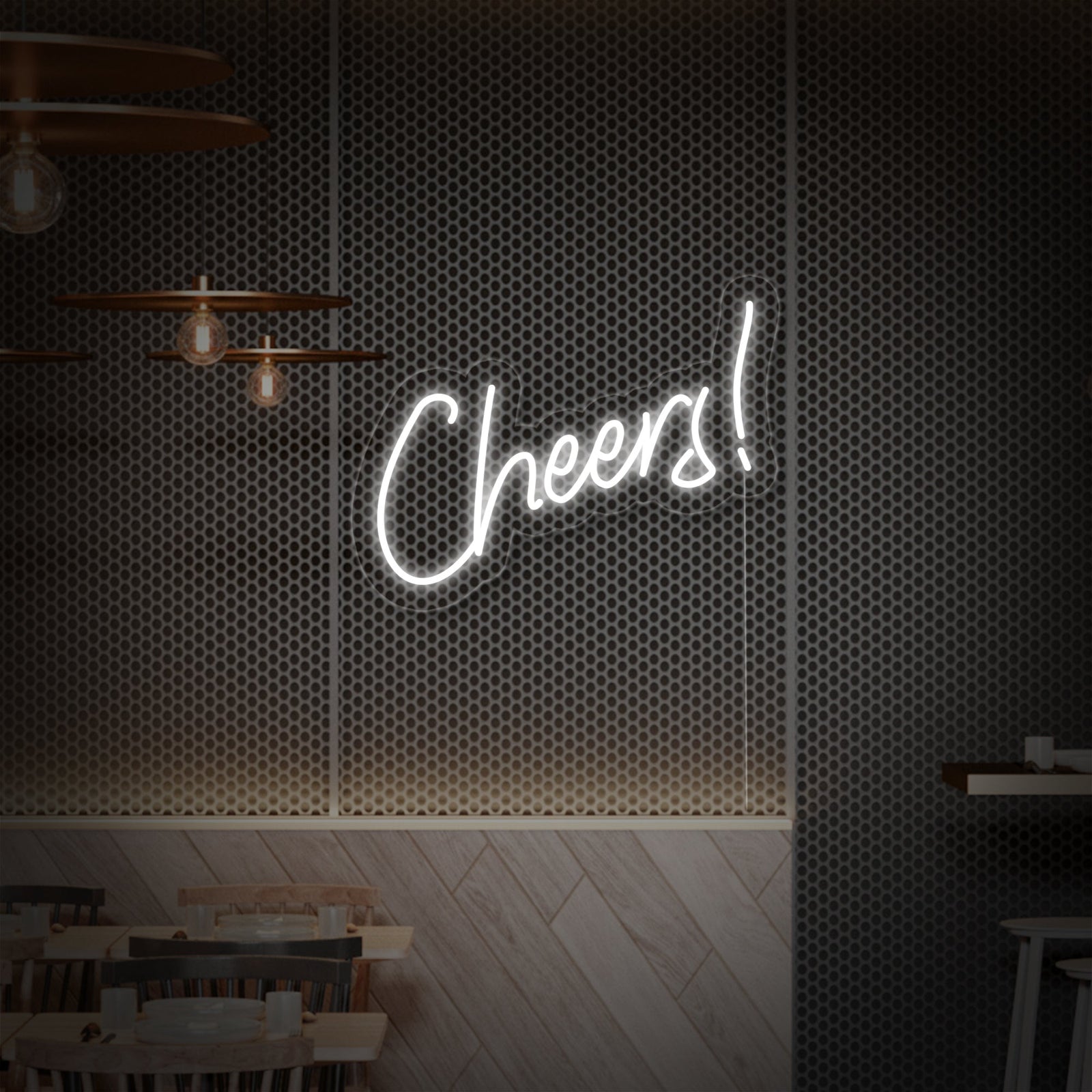 A glowing 'Cheers' neon sign in orange script displayed above a modern drink setup