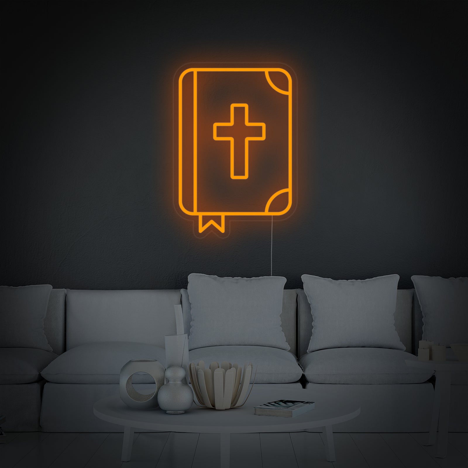 A close-up view of the Christian Holy Bible neon sign design, featuring its specific lettering and cross icon, glowing against a dark, textured wall.