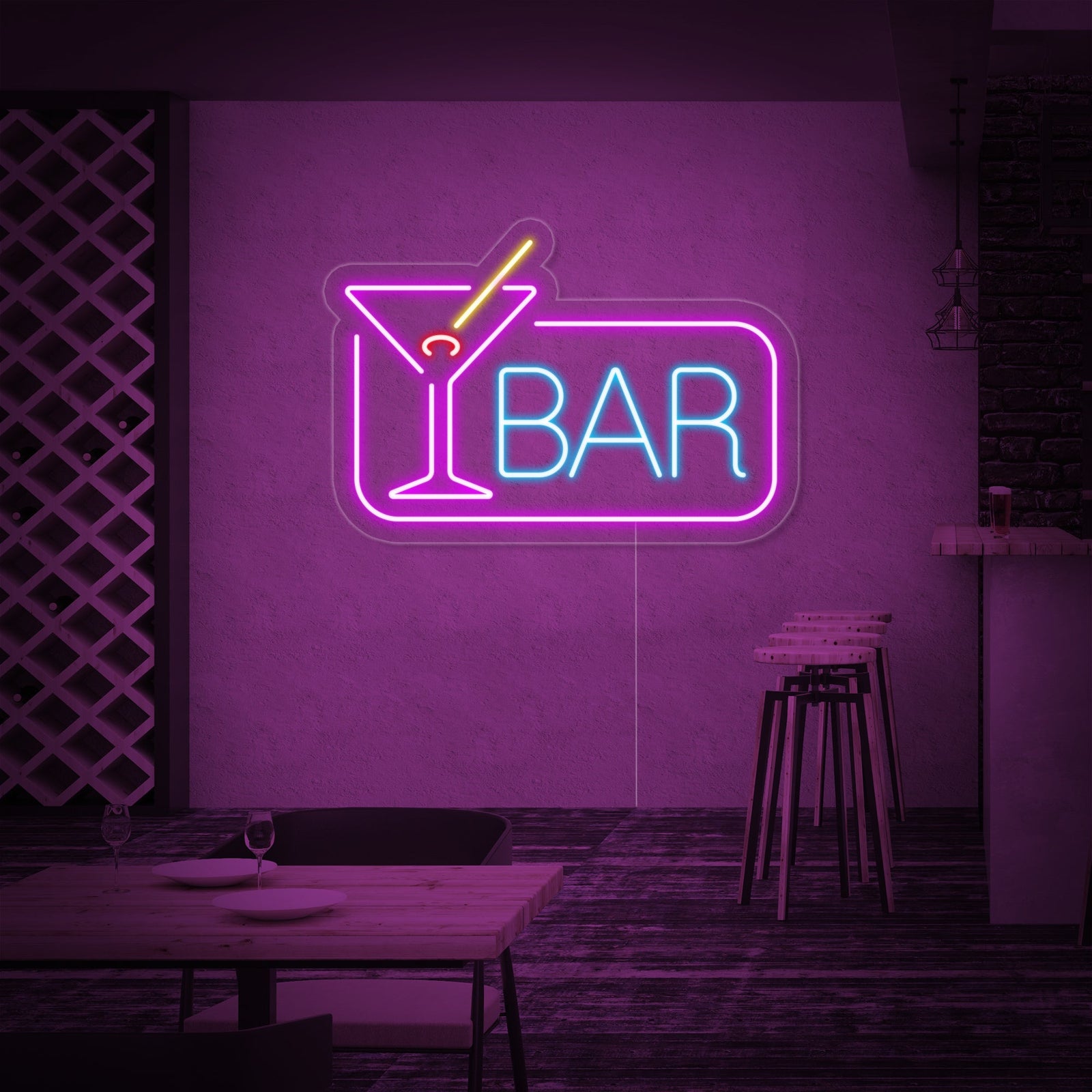 Close-up detail of the illuminated 'Cocktail Bar' neon sign, showing the clear acrylic backing and glowing text on a blurred background of spirit bottles.