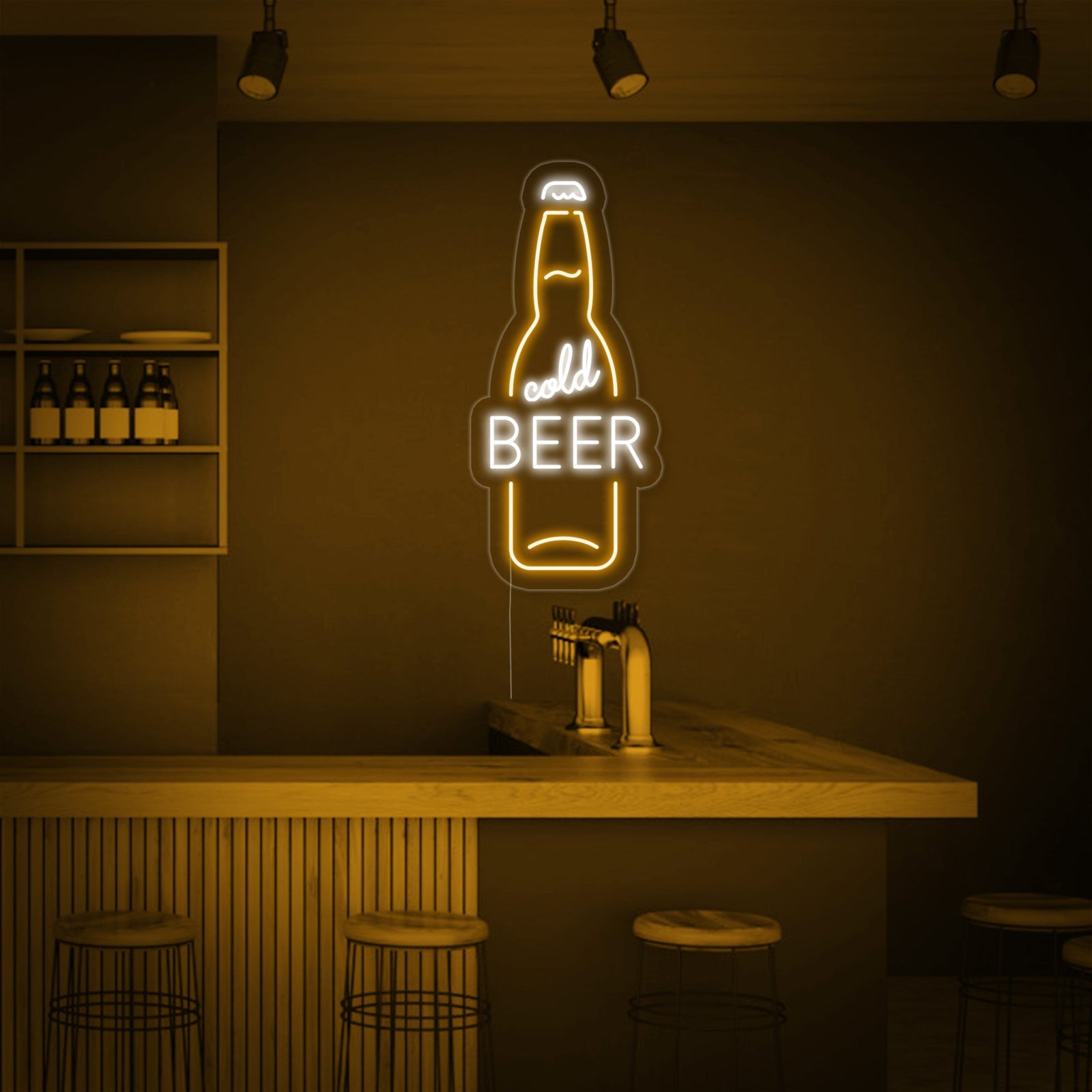 Close up of an orange and blue cold beer bottle neon sign mounted on a textured brick wall in a dimly lit bar area.