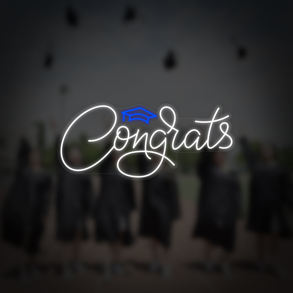 A clean, detailed product shot of the "Congrats" neon sign, showing its shape and clarity against a blurred celebratory background.