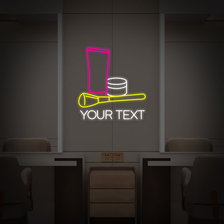 Close-up photograph of a custom 'Cosmetic Makeup Beauty Salon' neon sign, showing the detailed illuminated tubing, acrylic backing, and mounting hardware against a textured wall.