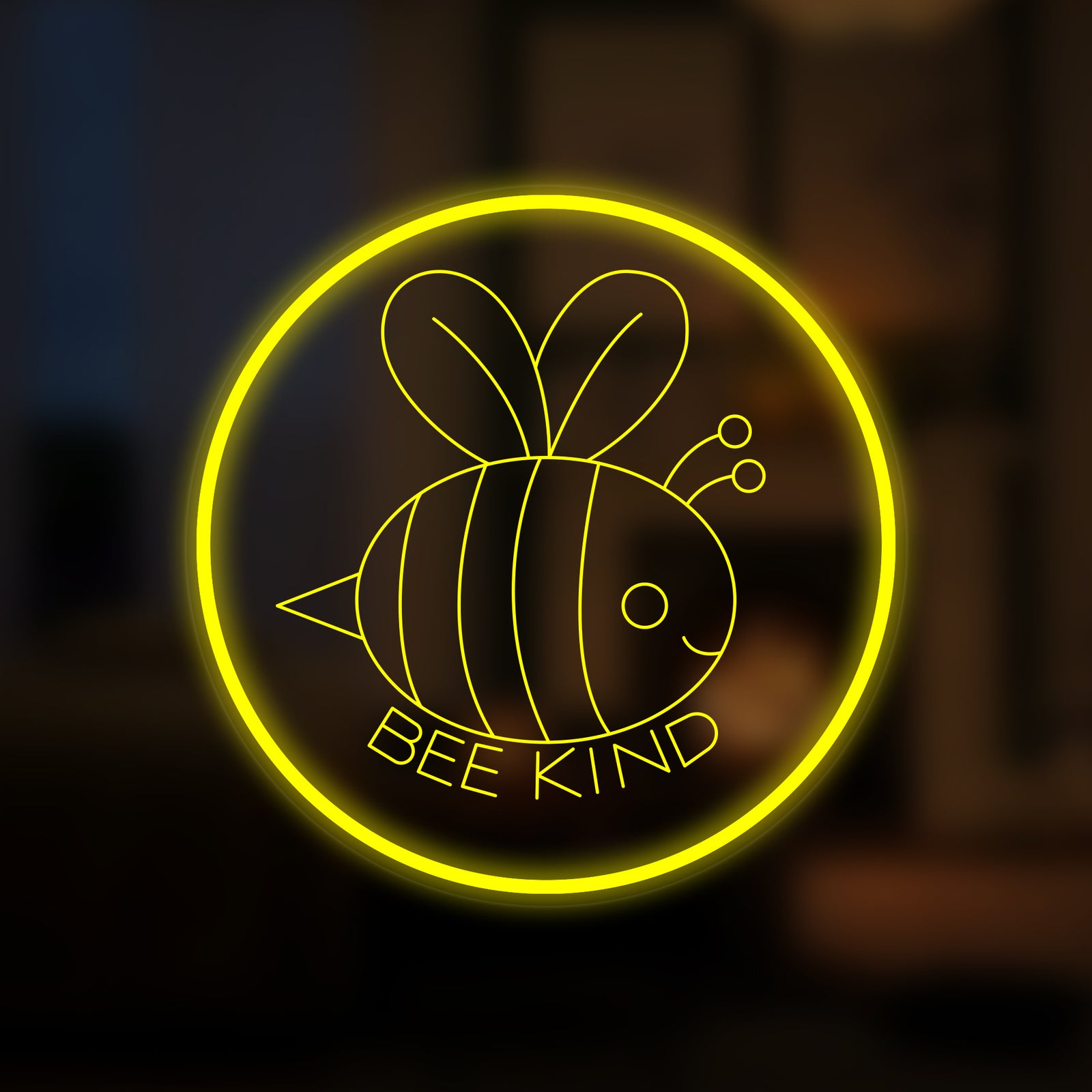 A graphic representation of the glowing Cute Bee Be Kind Mini Neon Sign with uniform lines against a softly blurred, neutral indoor background.