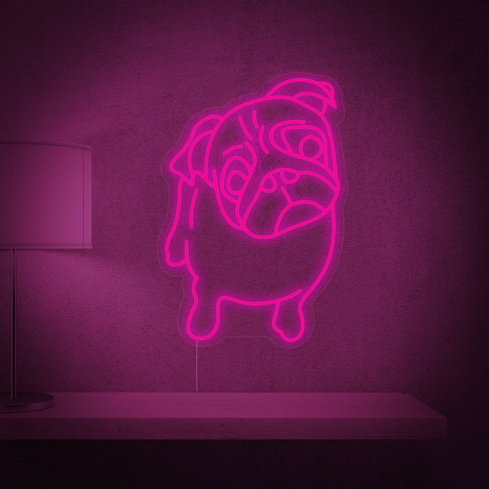 Illuminated white 'Cute Puppy' dog face neon sign against a simple light-colored wall with visible power cord and mounting hardware.