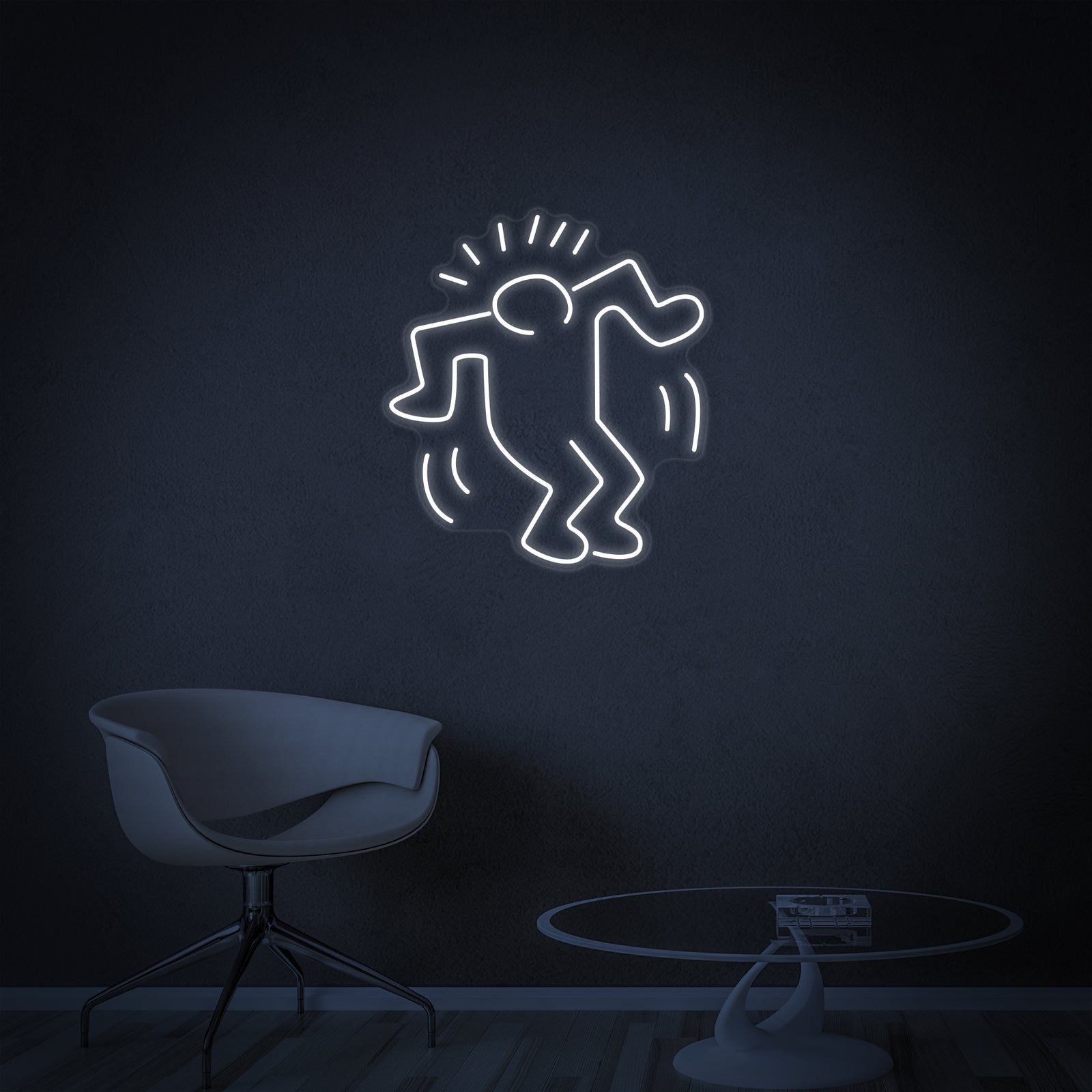 A wider shot showing the 'Dancing Man' neon sign illuminated, adding a cool white glow to a modern interior space with plants.
