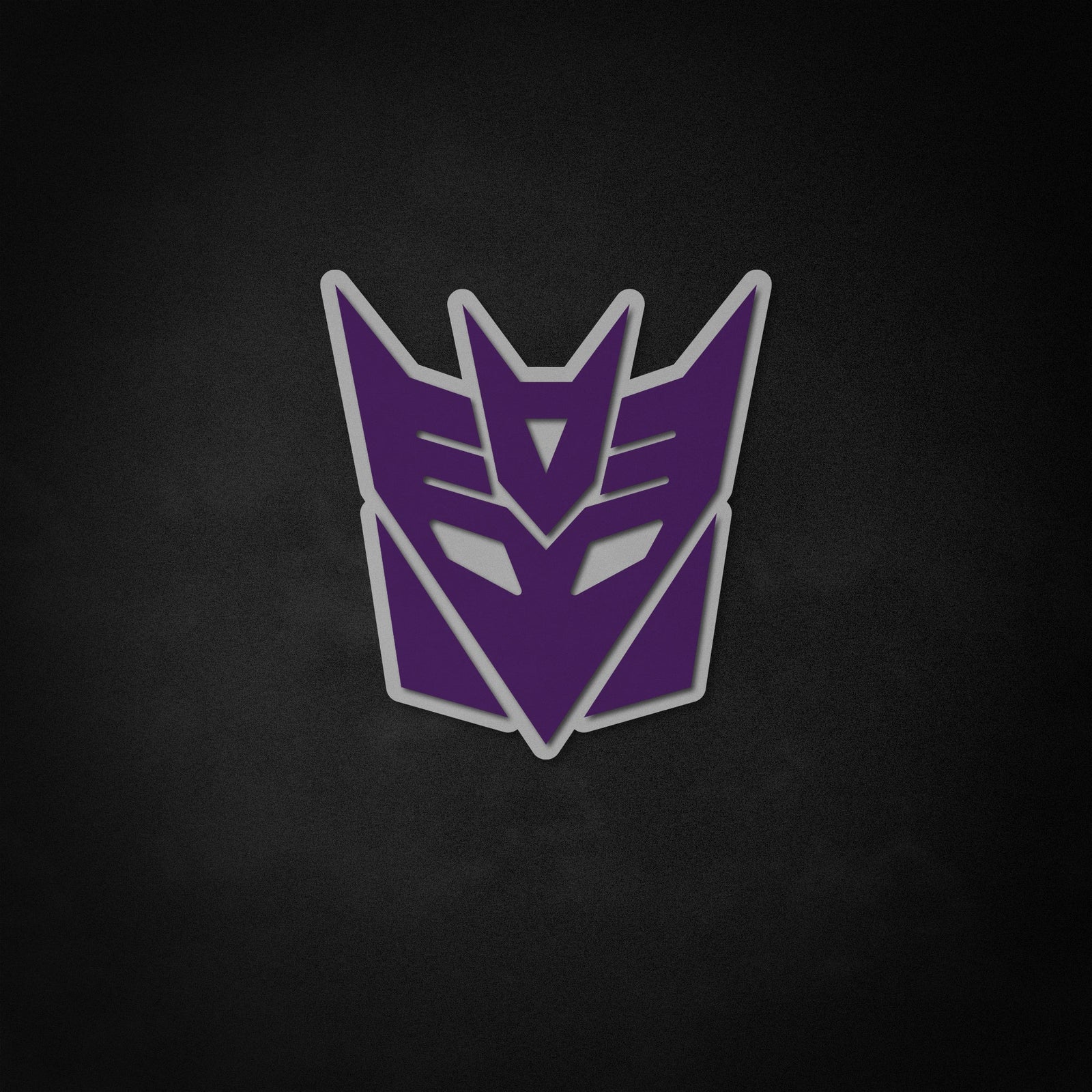Graphic mockup showing the purple Decepticon neon sign effect against a textured wall.