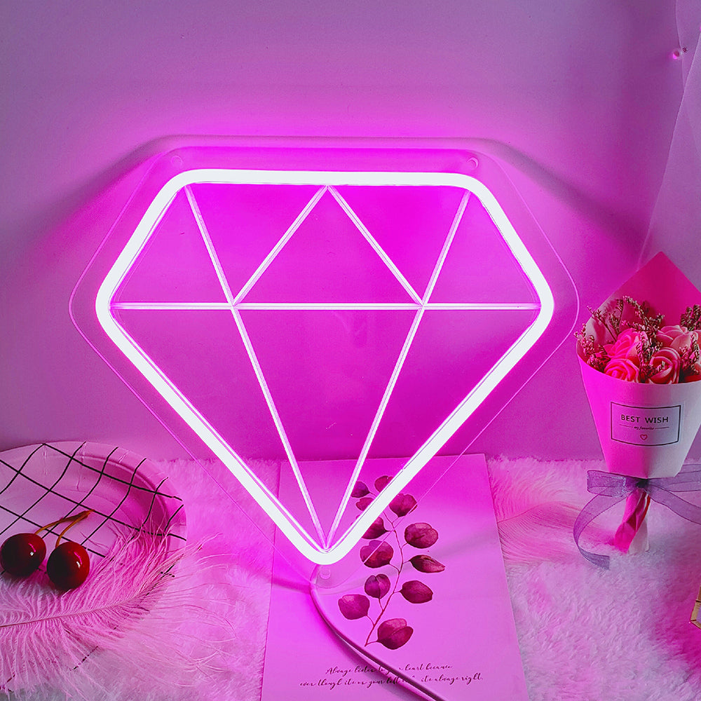 Compact USB-powered Diamond mini neon sign glowing brightly near other small room decorations.