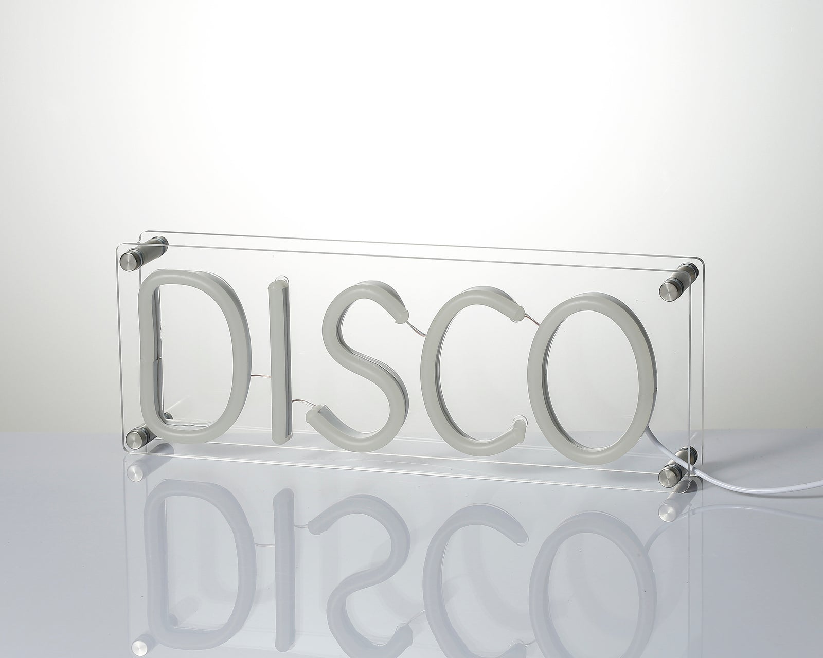Close-up detail of 'Disco' desk neon sign showing acrylic craftsmanship