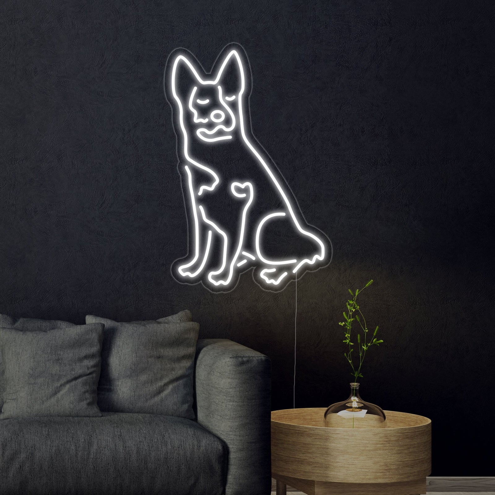 The glowing 'Drovers Dog' neon sign displaying the silhouette of a drover's dog within a neon circle.