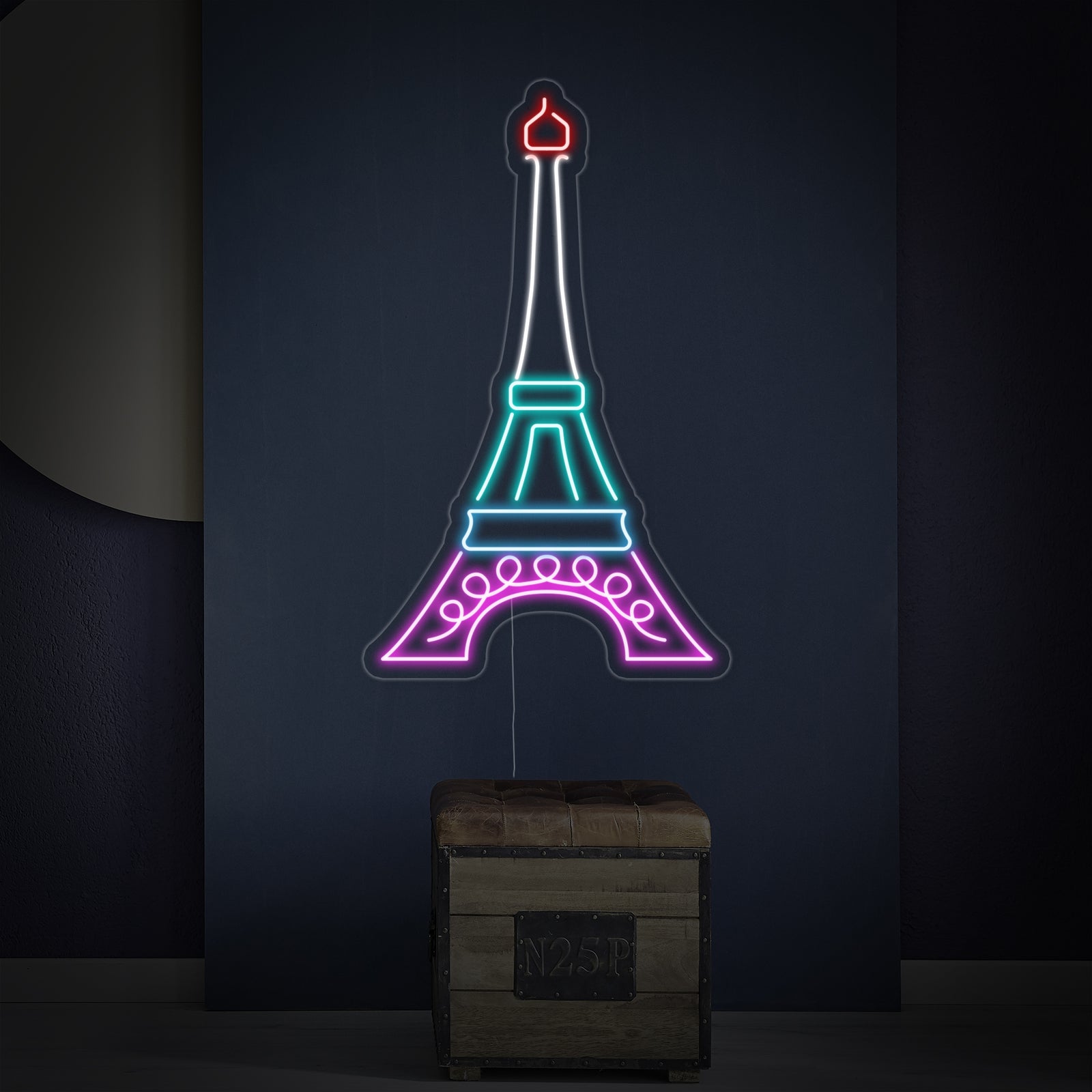 Close-up detailed view of the illuminated Eiffel Tower neon sign showcasing its clear acrylic backing and precise design.