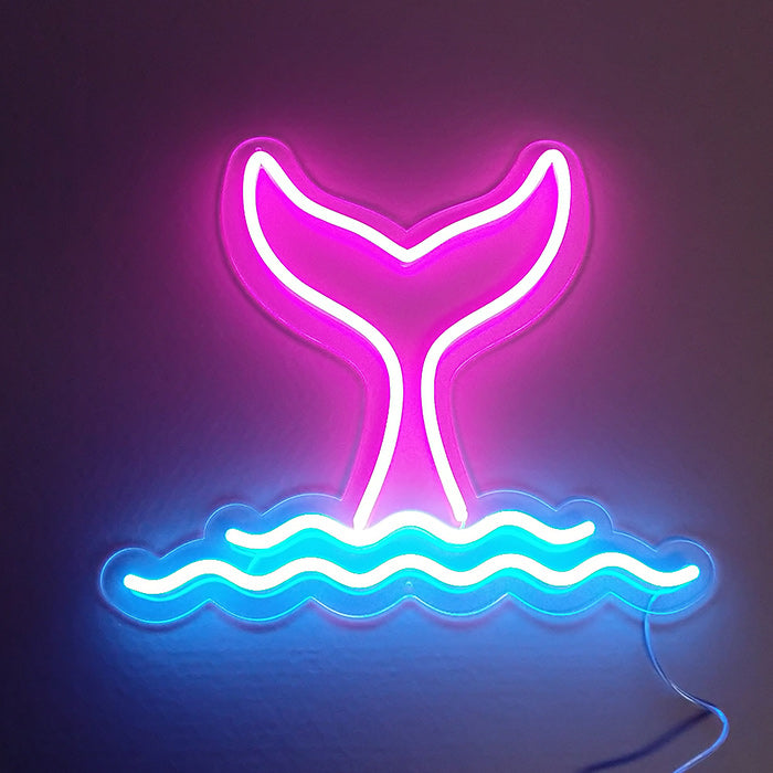 A neon wall sign depicting a swimming mermaid within a stylized element symbol framework, emitting a soft, vibrant glow against a textured indoor wall, complete with mounting hardware and clear power cord.