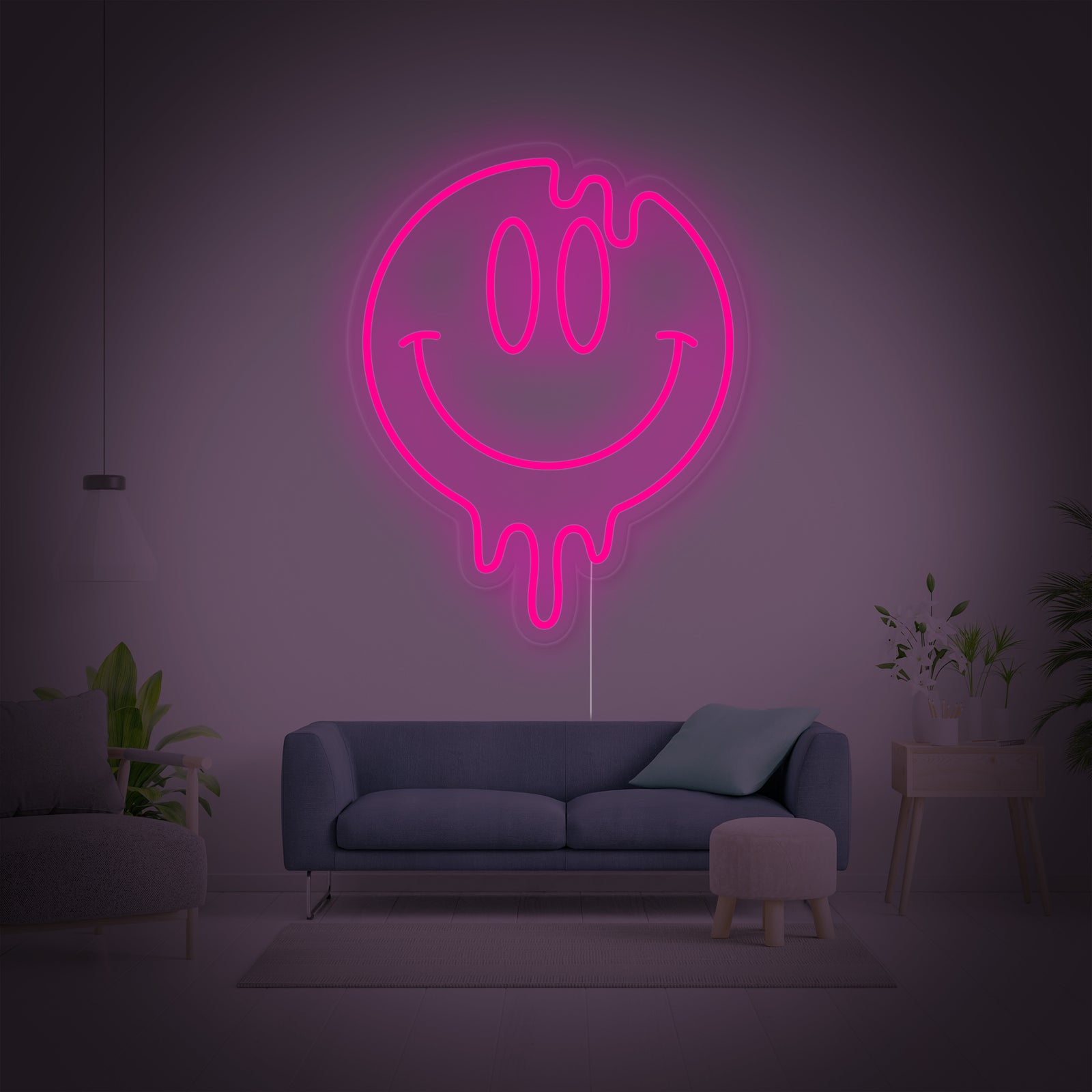 Close-up photograph of the Dripping Smiley Face neon sign glowing brightly on a textured wall, showing its unique melting design